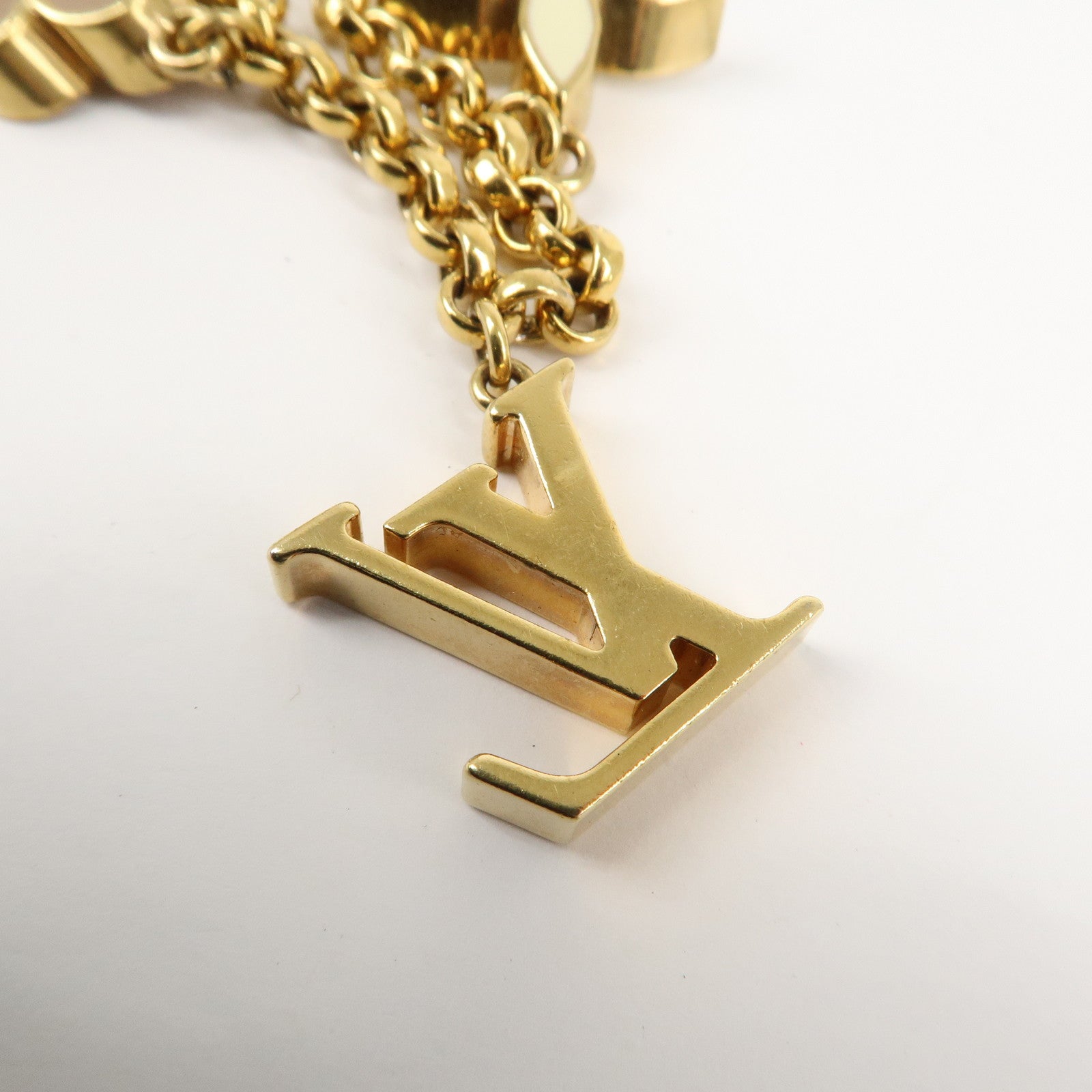 Louis Vuitton Fleur de Monogram Bag Charm Key Chain Gold M65111 Used