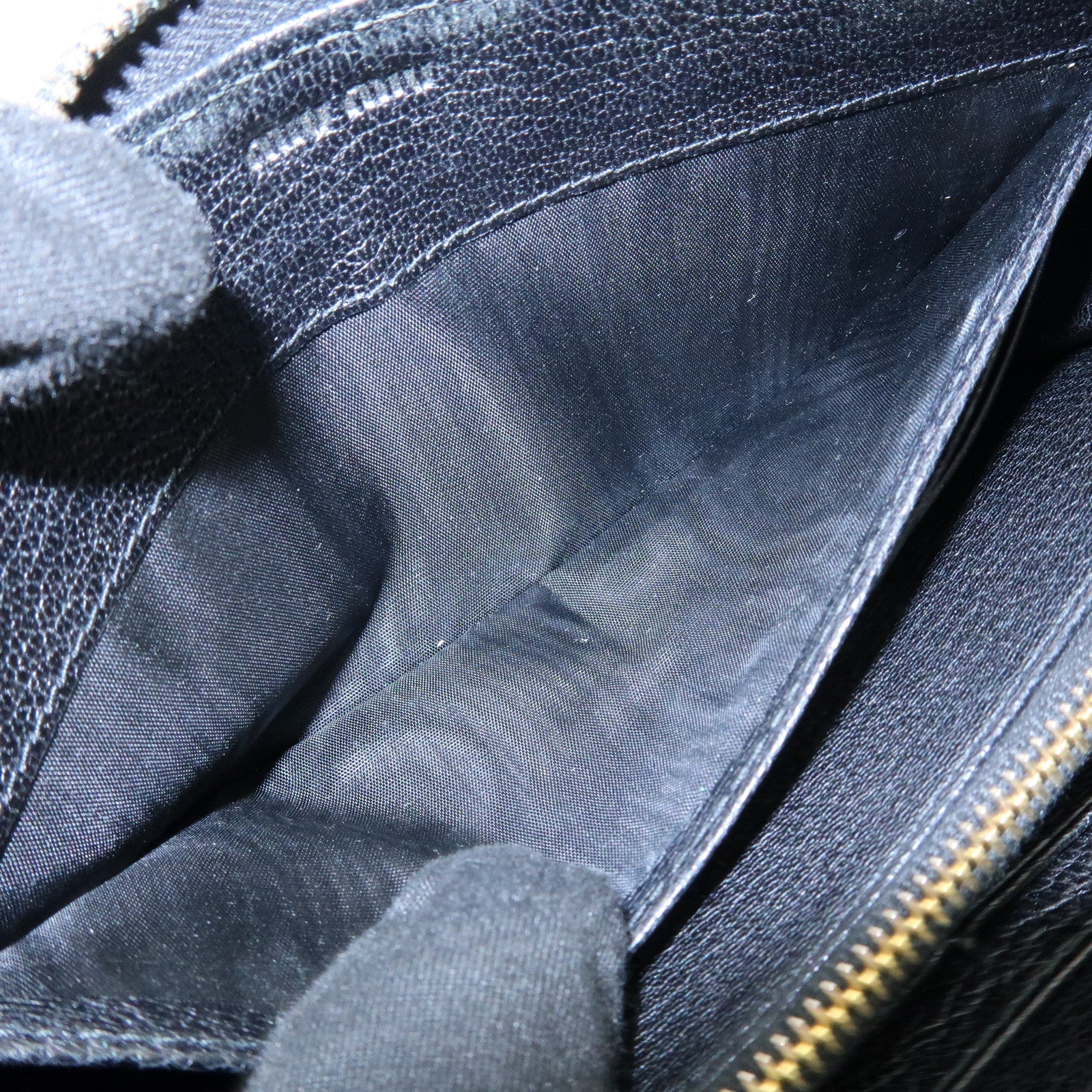 MIU MIU Logo Leather Studs Zippy Long Wallet Black 5M0506