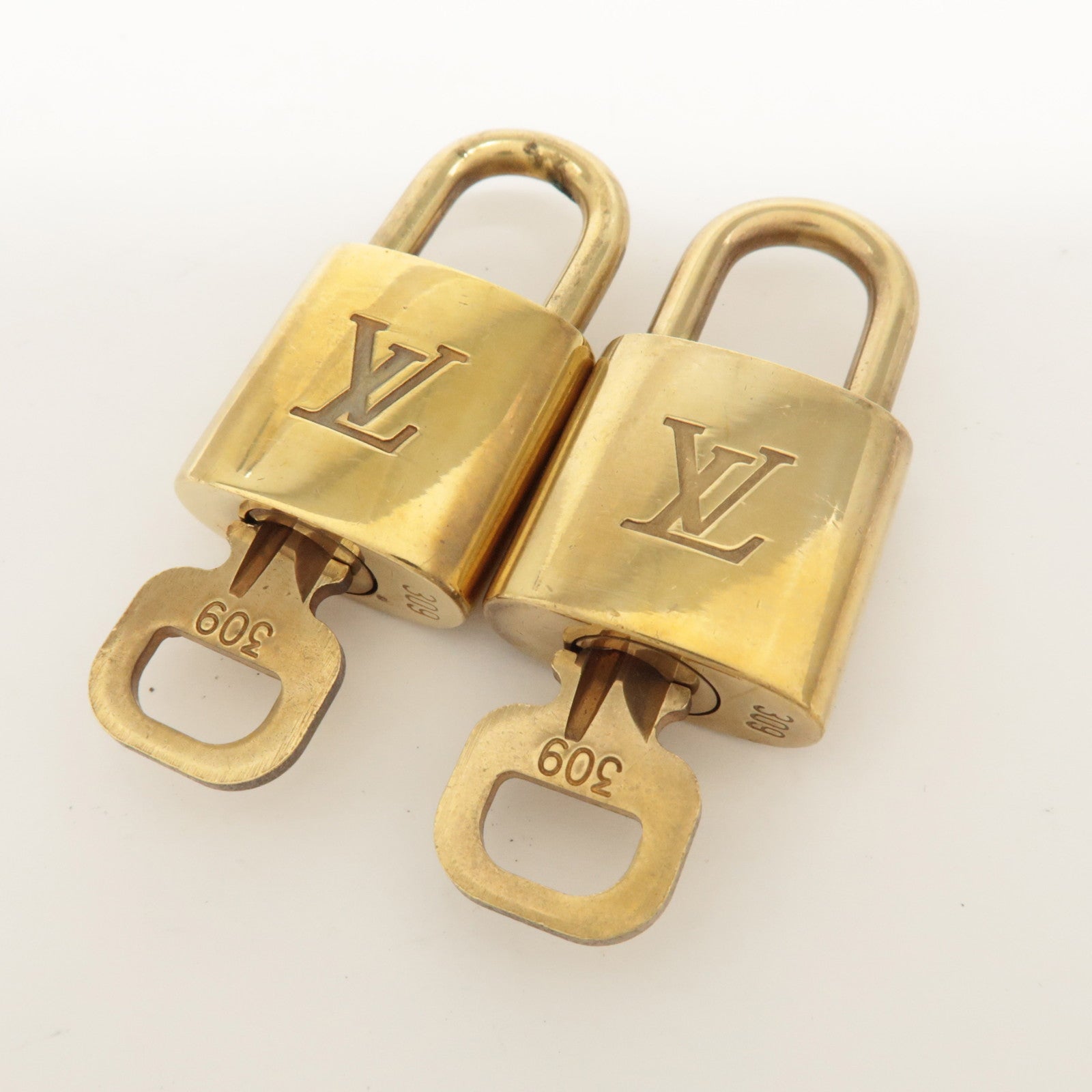 Louis Vuitton Set of 10 Lock & Key Cadena Key Lock Metal Gold