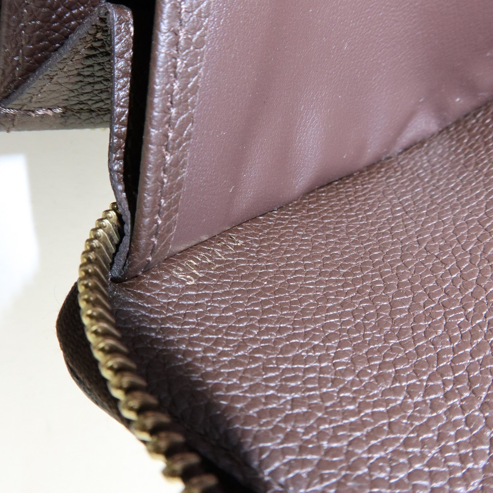 Louis Vuitton Monogram Empreinte Round Zippy Wallet Terre M60548