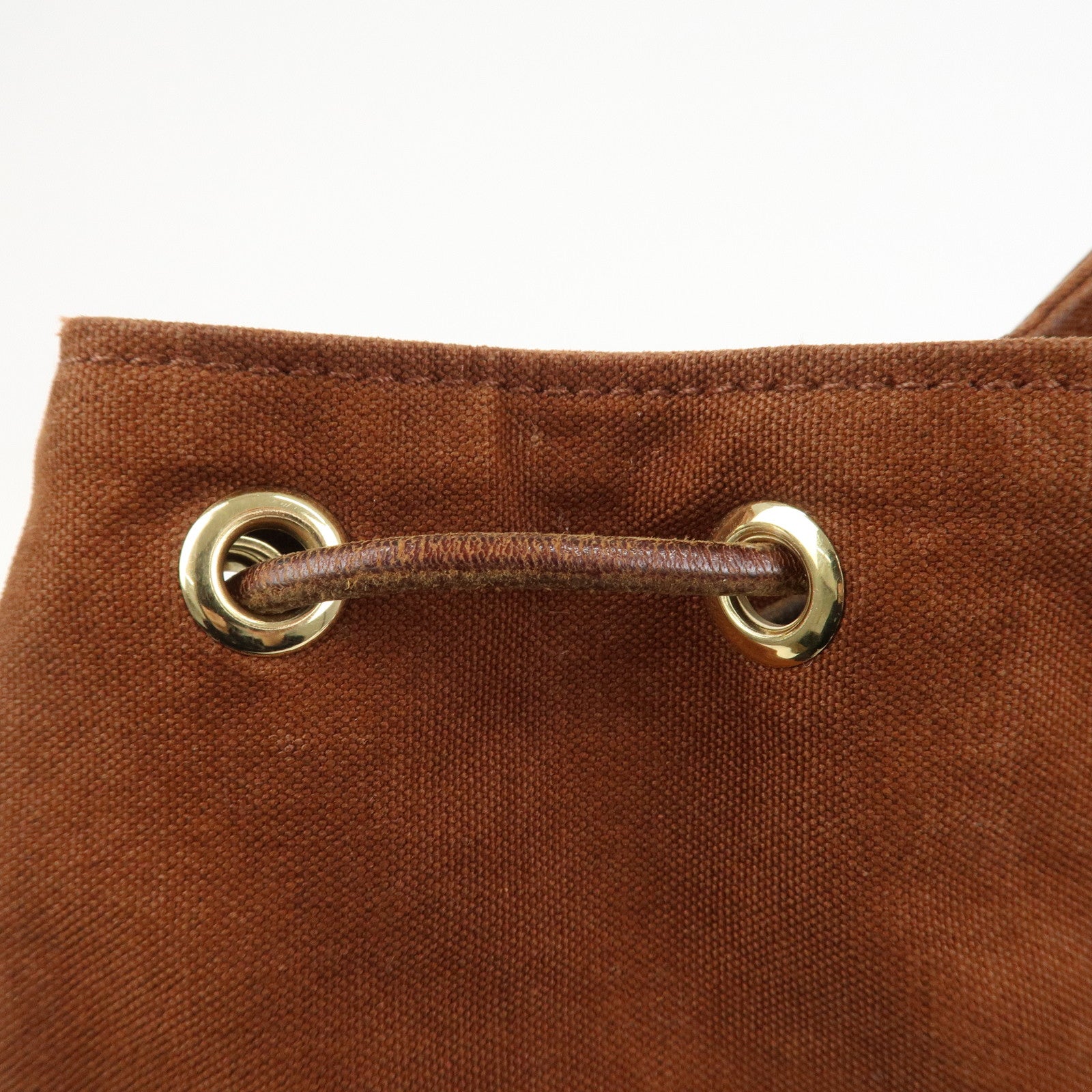 HERMES Canvas Leather Porochon Mimil PM Drawstring Backpack Brown