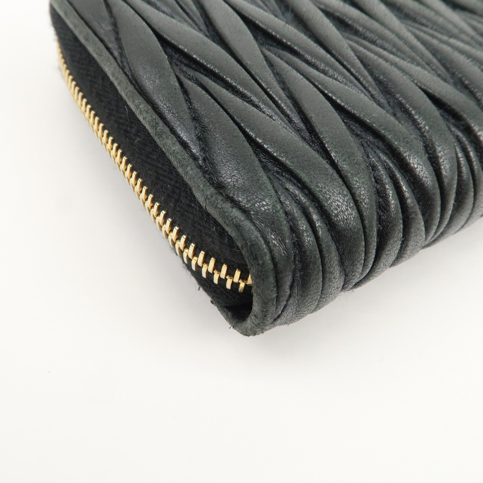 MIU MIU Logo Matelasse Nappa Leather Zippy Long Wallet Black