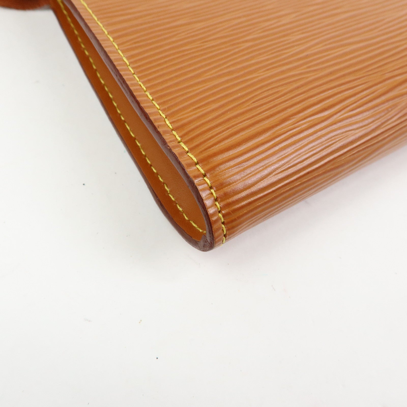Louis Vuitton Epi Pochette Accessoires Pouch Zipang Gold M52948