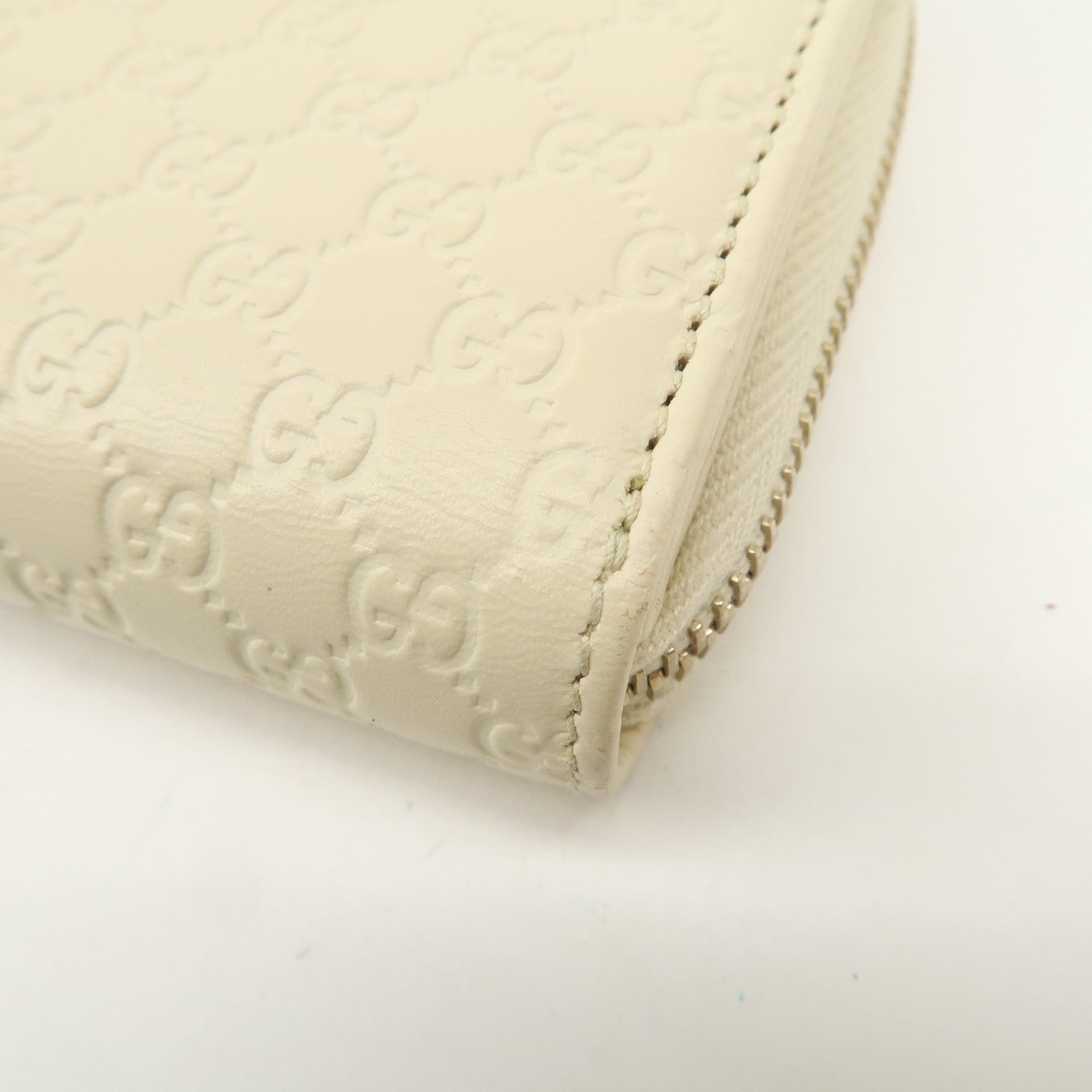 GUCCI Micro Guccissima Leather Signature Bi-Fold Compact Wallet Ivory Used