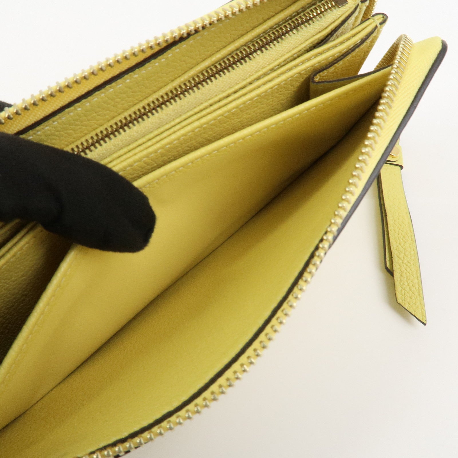 Louis Vuitton Monogram Empreinte Round Zippy Wallet Jaune M82043