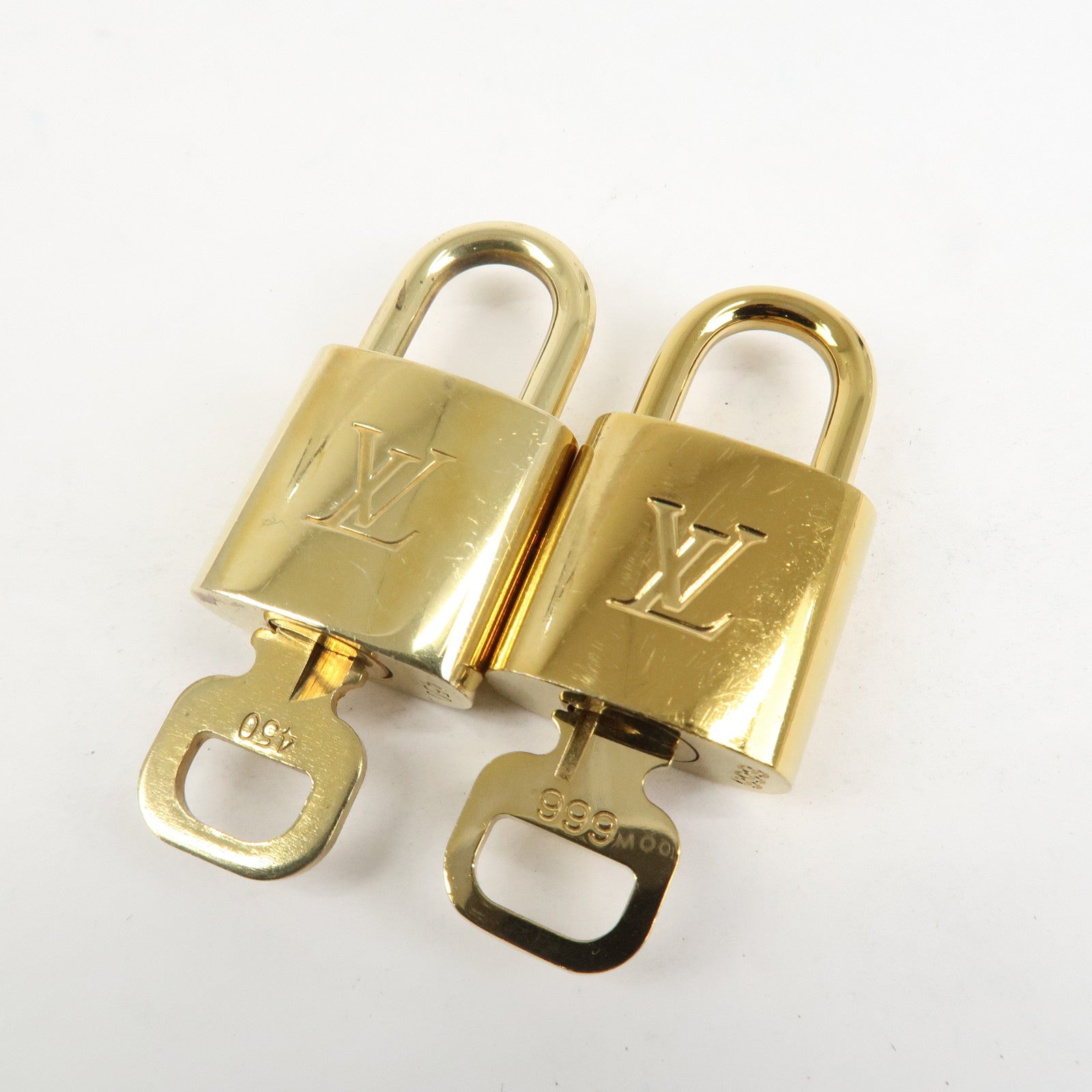 Louis Vuitton Set of 10 Lock & Key Cadena Key Lock Metal Gold