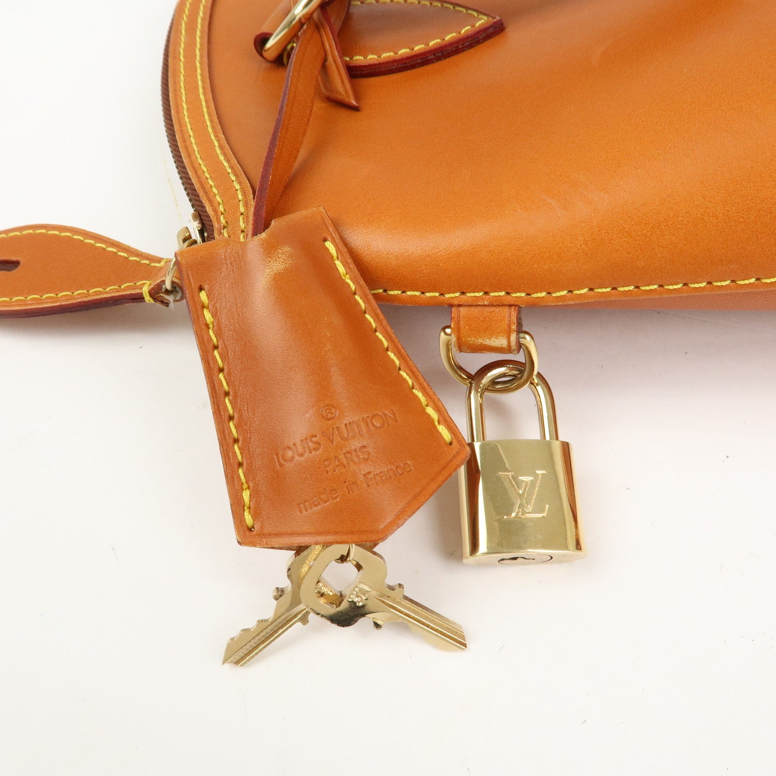 Louis Vuitton Lockit Nomade Leather Hand Bag Caramel Brown M85388
