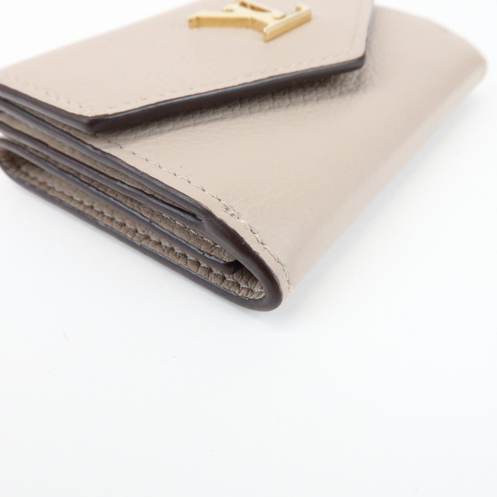 Louis Vuitton Torillon Portefeuille Lock Mini Wallet Greige M69340