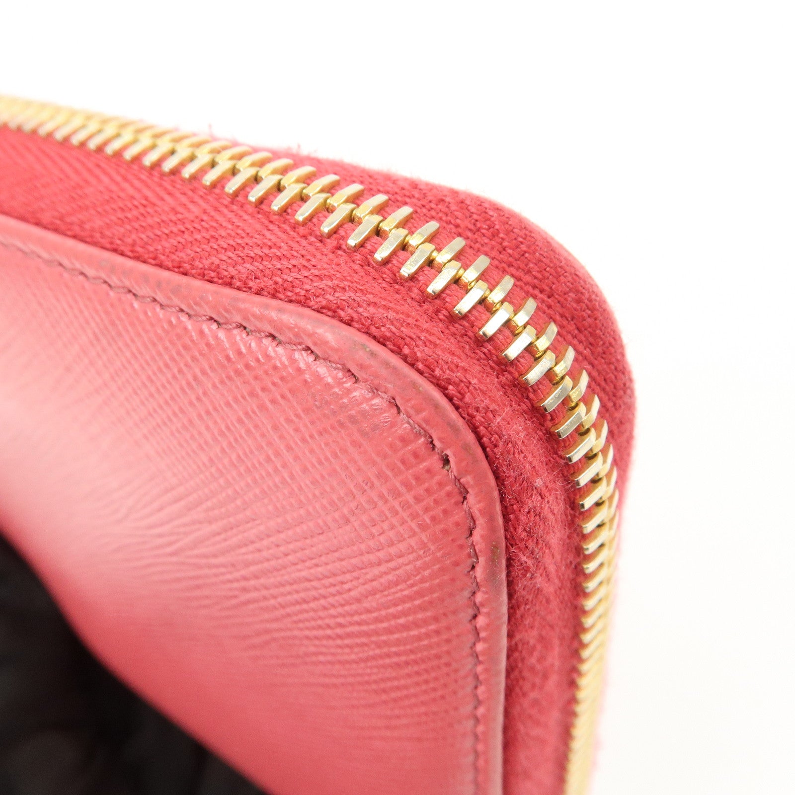 PRADA Logo Saffiano Leather Round Zippy Long Wallet Pink 1M0506