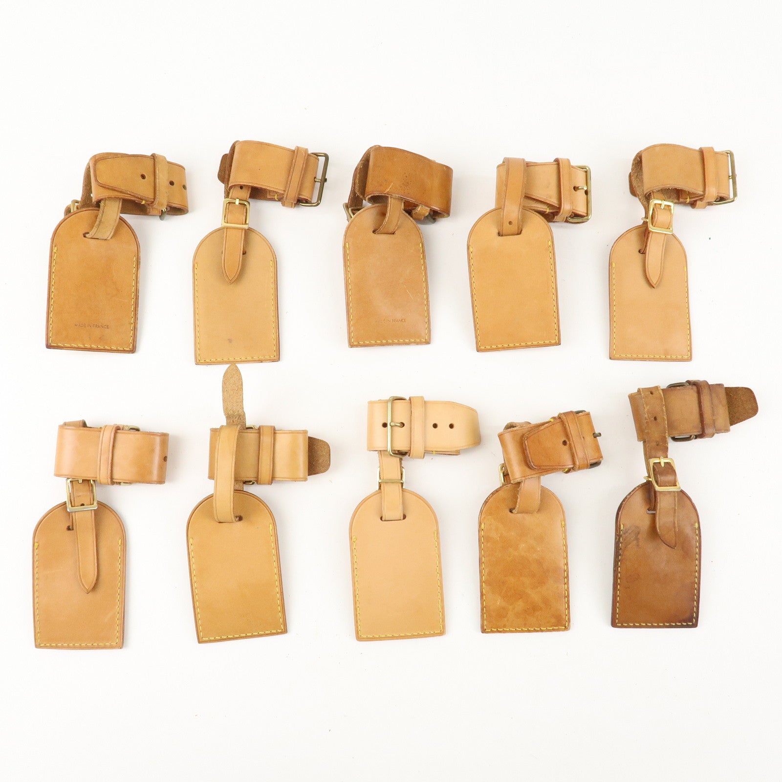 Louis Vuitton Set of 10Nume Leather Name Tag & Poignet Natural Used