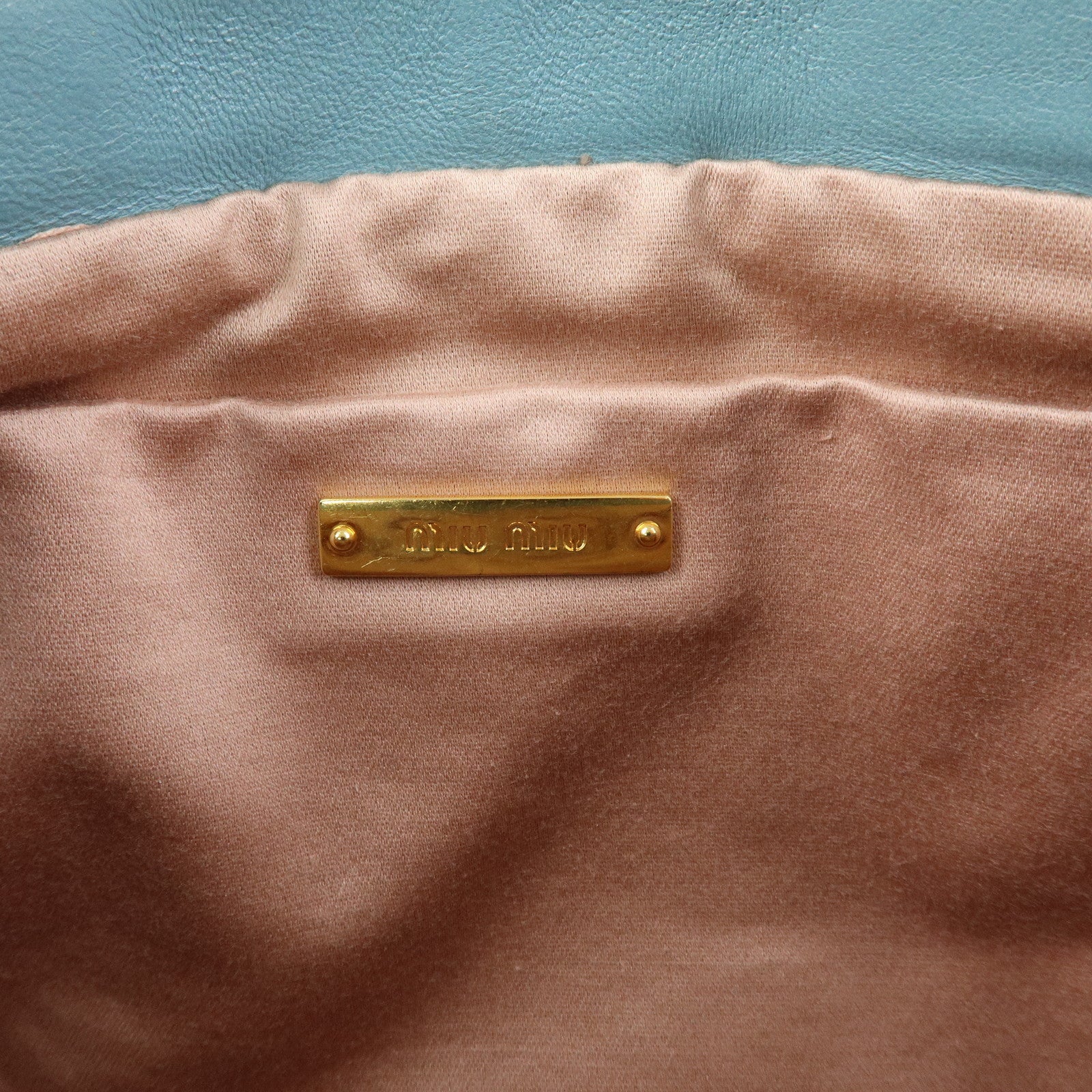 MIU MIU Logo Matelasse Nappa Leather Clutch Bag Light Blue 5N1573