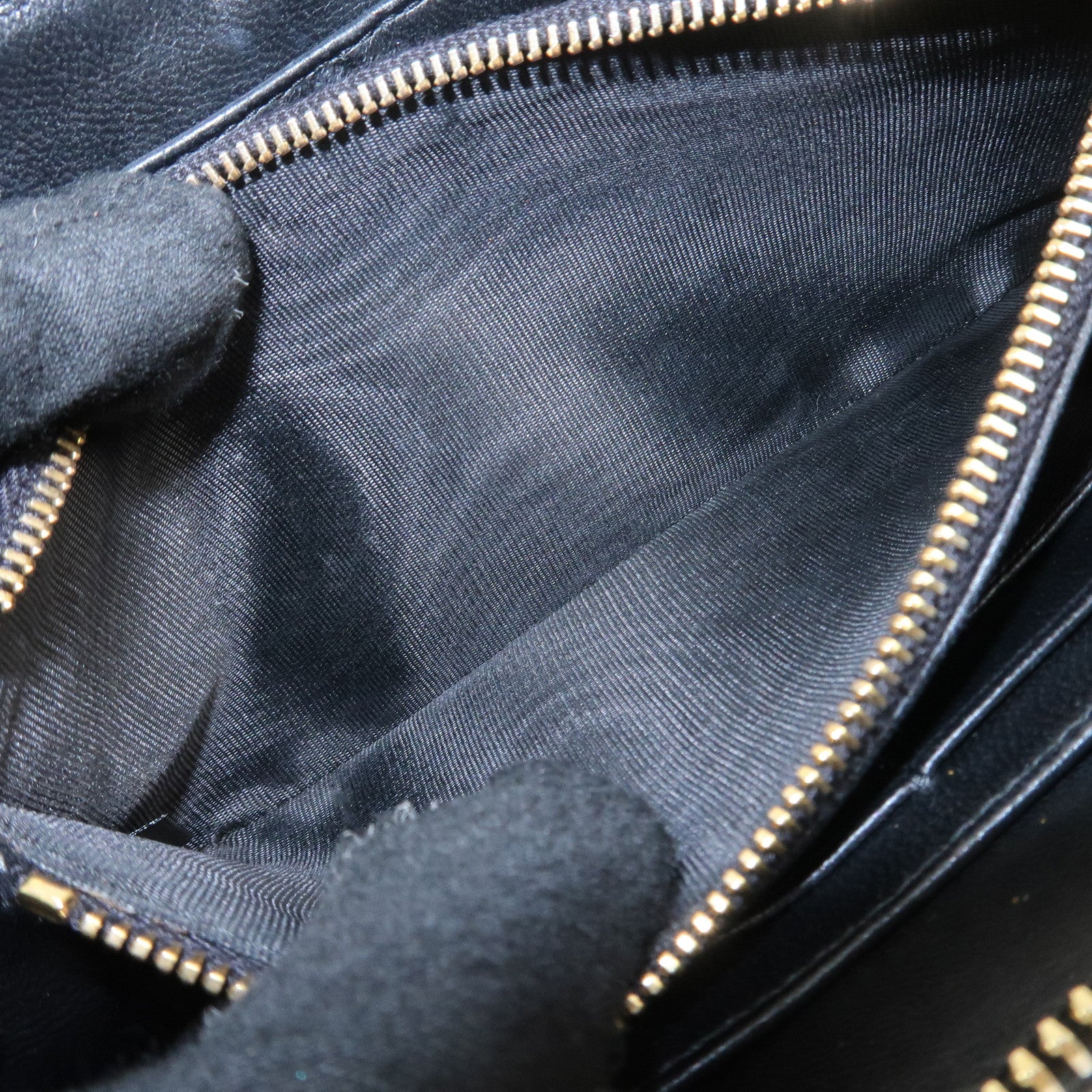 MIU MIU Matelasse Nappa Leather Zippy Long Wallet Black