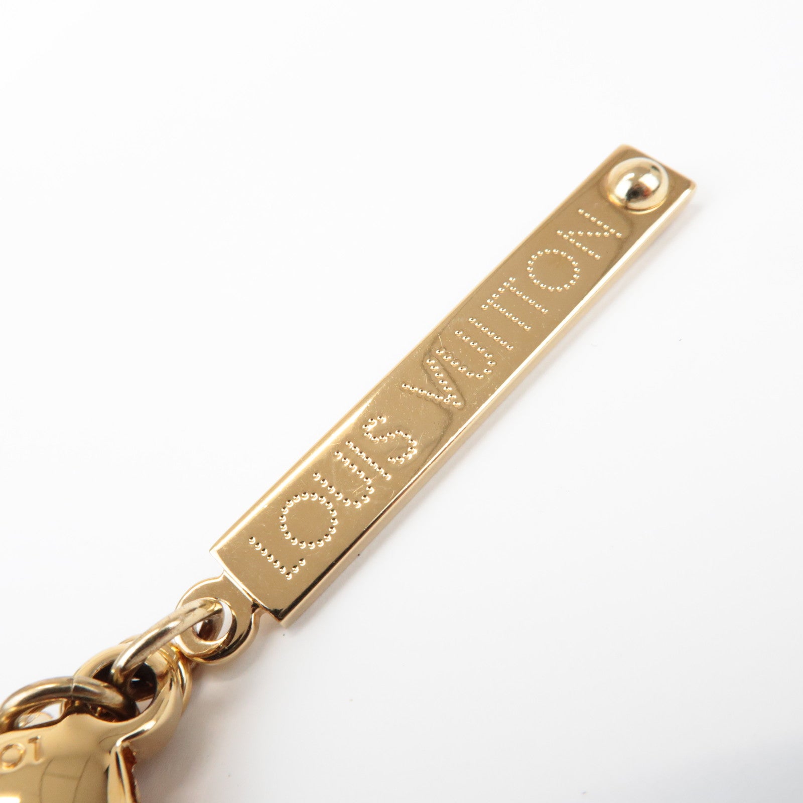 Louis Vuitton Bijoux Sac Tabage Bag Charm Gold Silver M65722