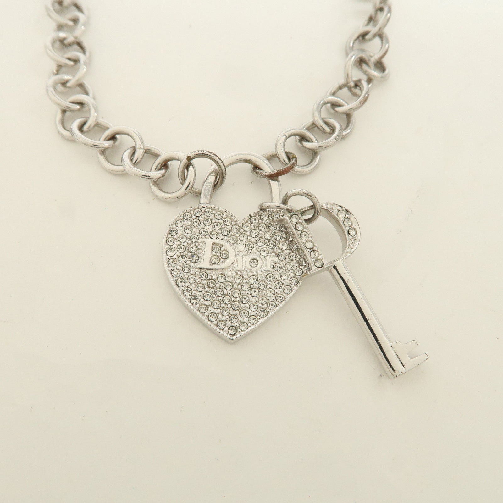 Christian Dior Logo Heart Lock & Key Pendant Metal Necklace Silver