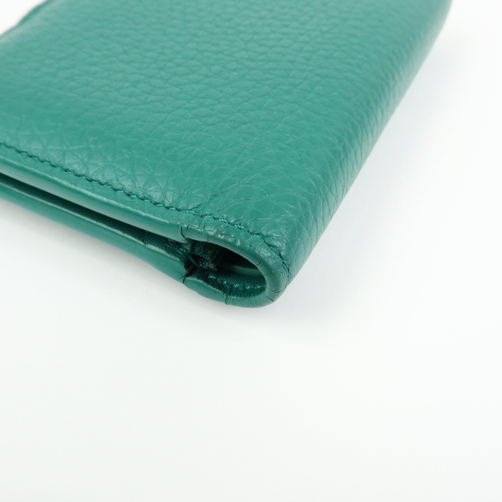 Louis Vuitton Taurillon Leather Vertical Compact Wallet M82438