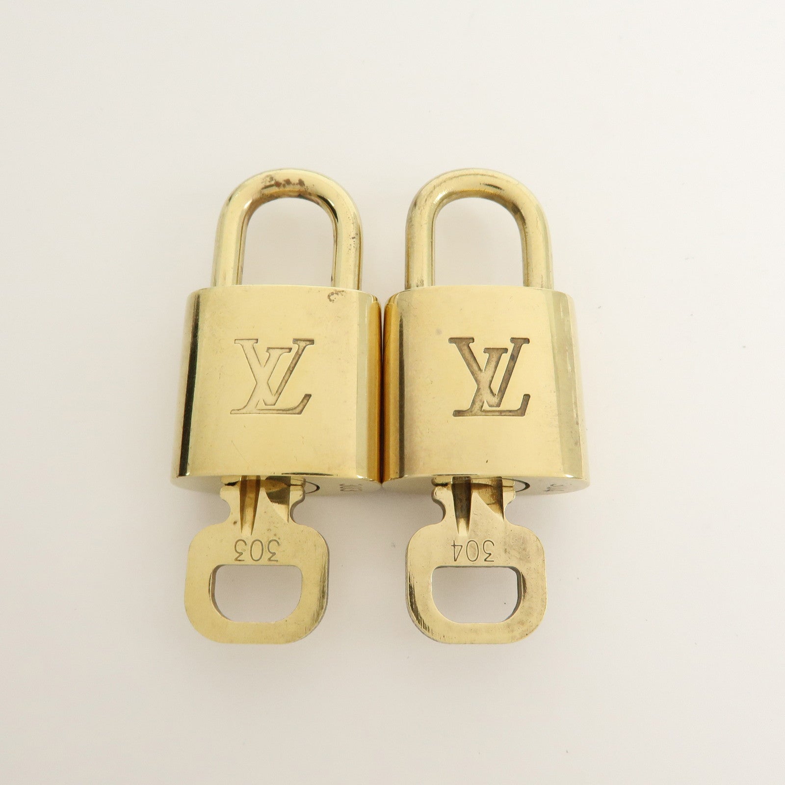 Louis Vuitton Set of 10 Lock & Key Cadena Key Lock Gold