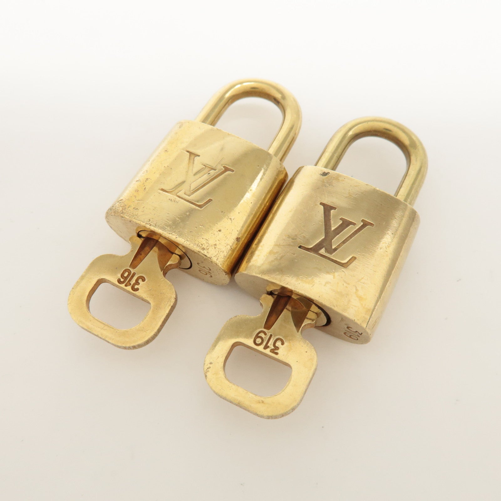 Louis Vuitton Set of 10 Lock & Key Cadena Key Lock Metal Gold