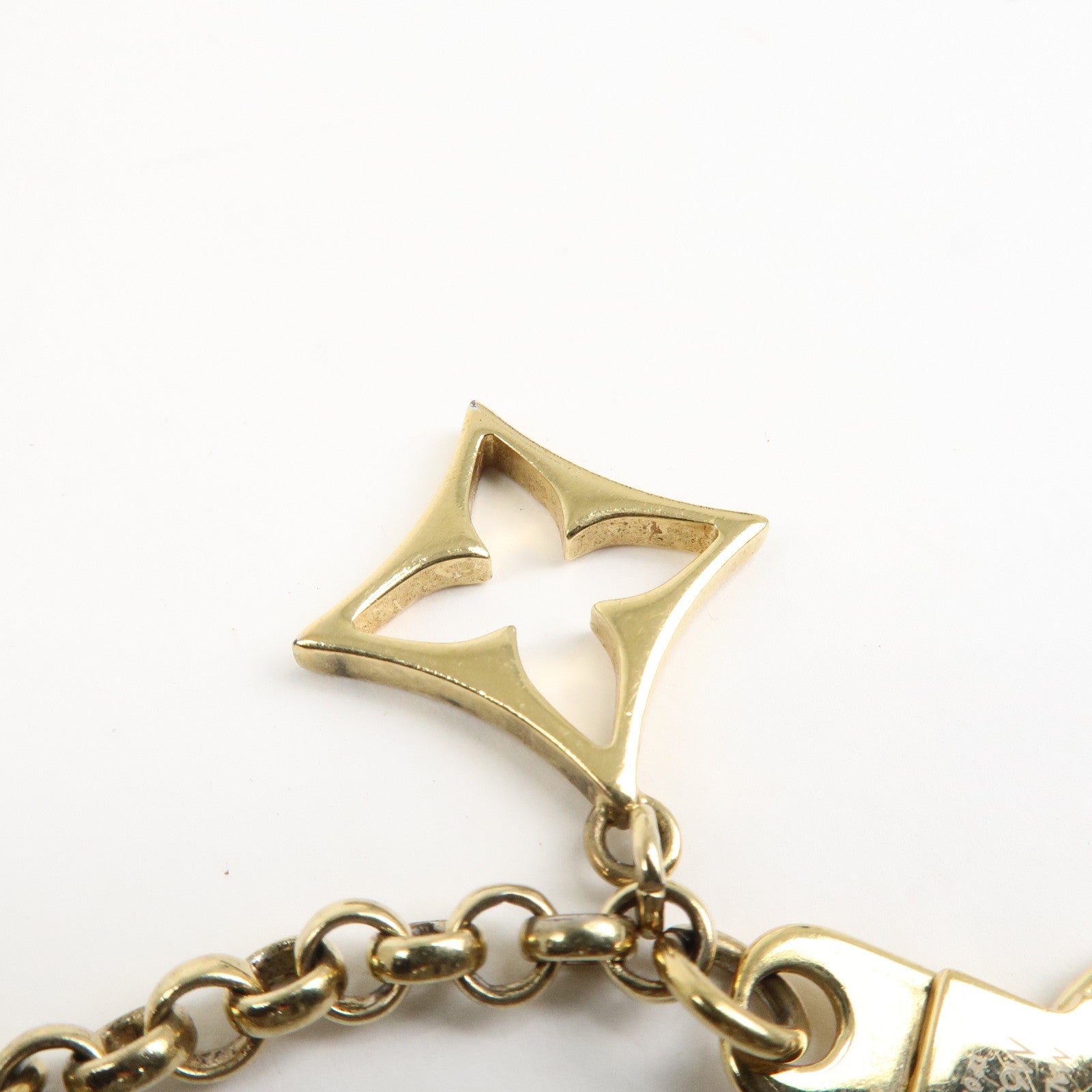 Louis Vuitton Fleur de Monogram Bag Charm Key Chain Gold M65111 Used