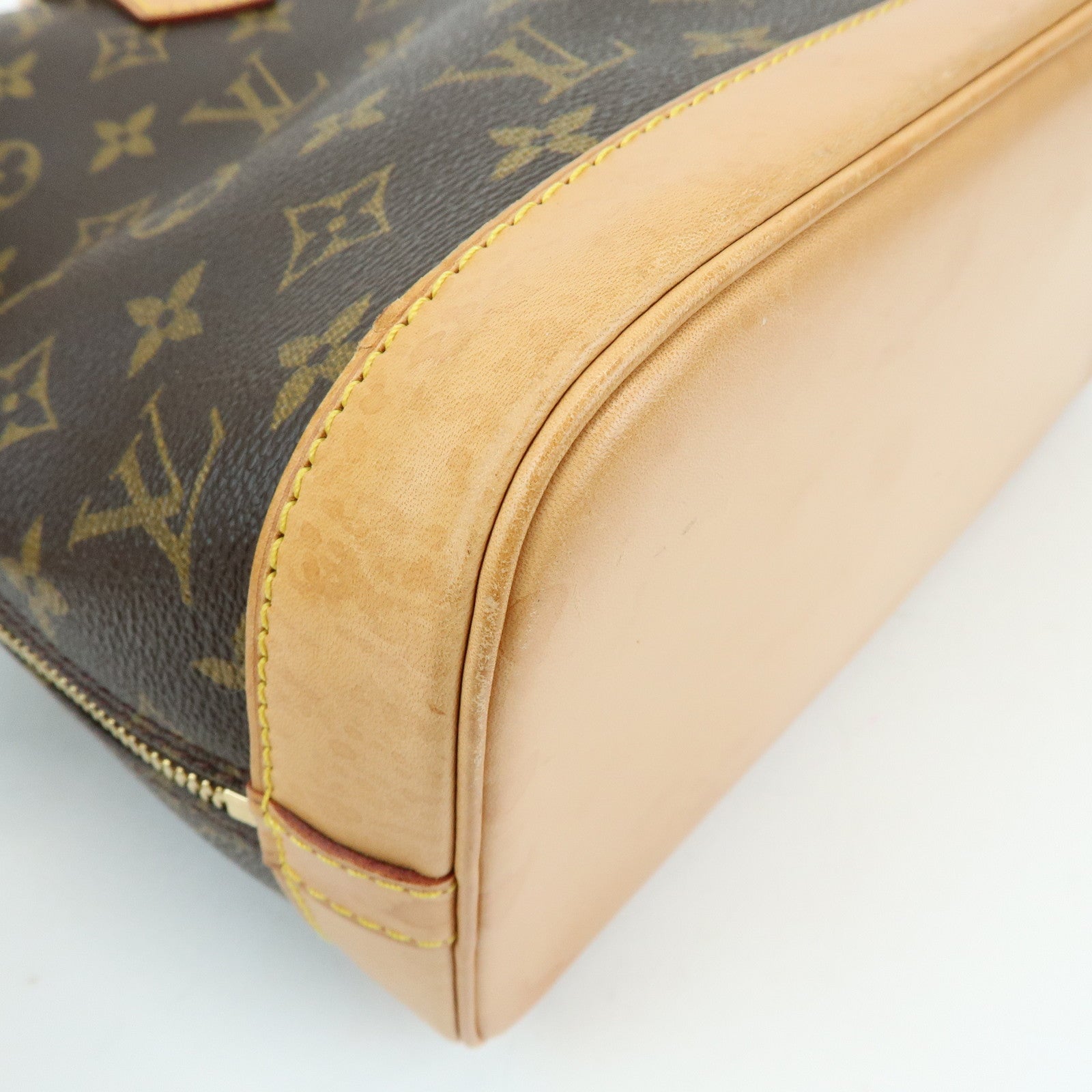 Louis Vuitton Monogram Alma Canvas Leather Hand Bag Brown M51130