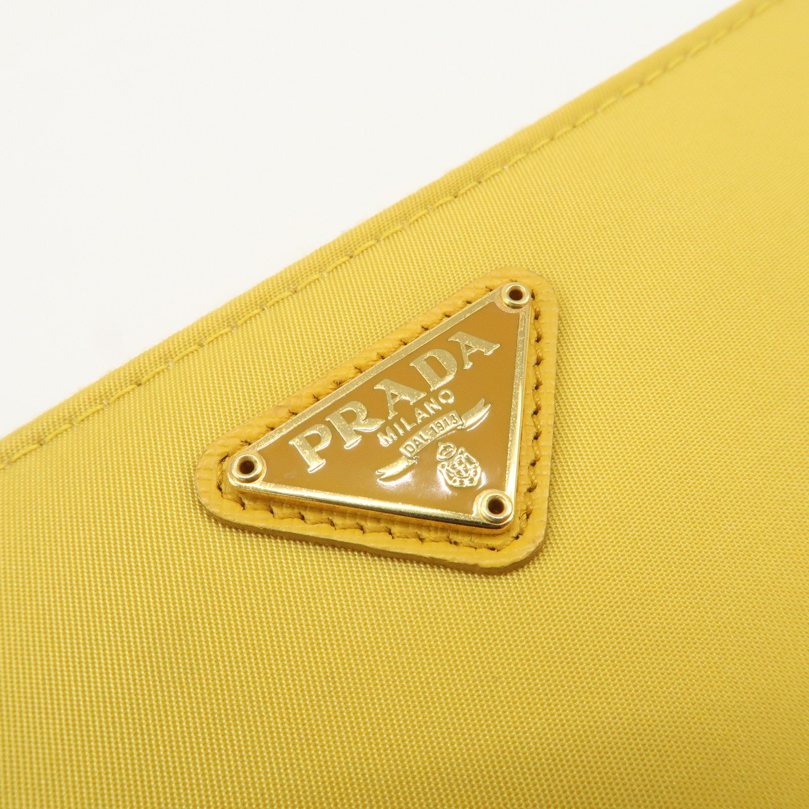 PRADA Triangle Logo Nylon Leather Round Zippy Long Wallet Yellow