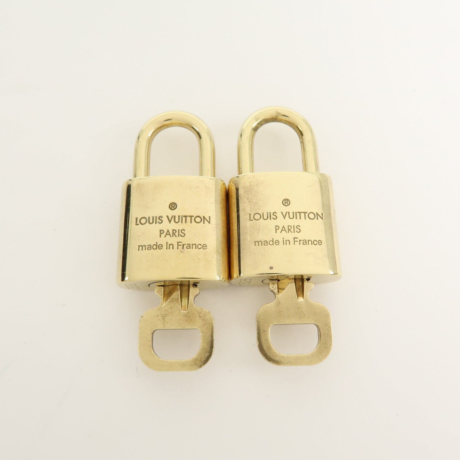 Louis Vuitton Set of 10 Lock & Key Cadena Key Lock Gold