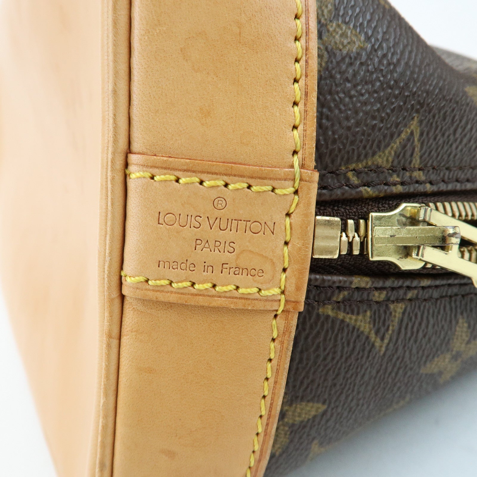 Louis Vuitton Monogram Alma Canvas Leather Hand Bag Brown M51130