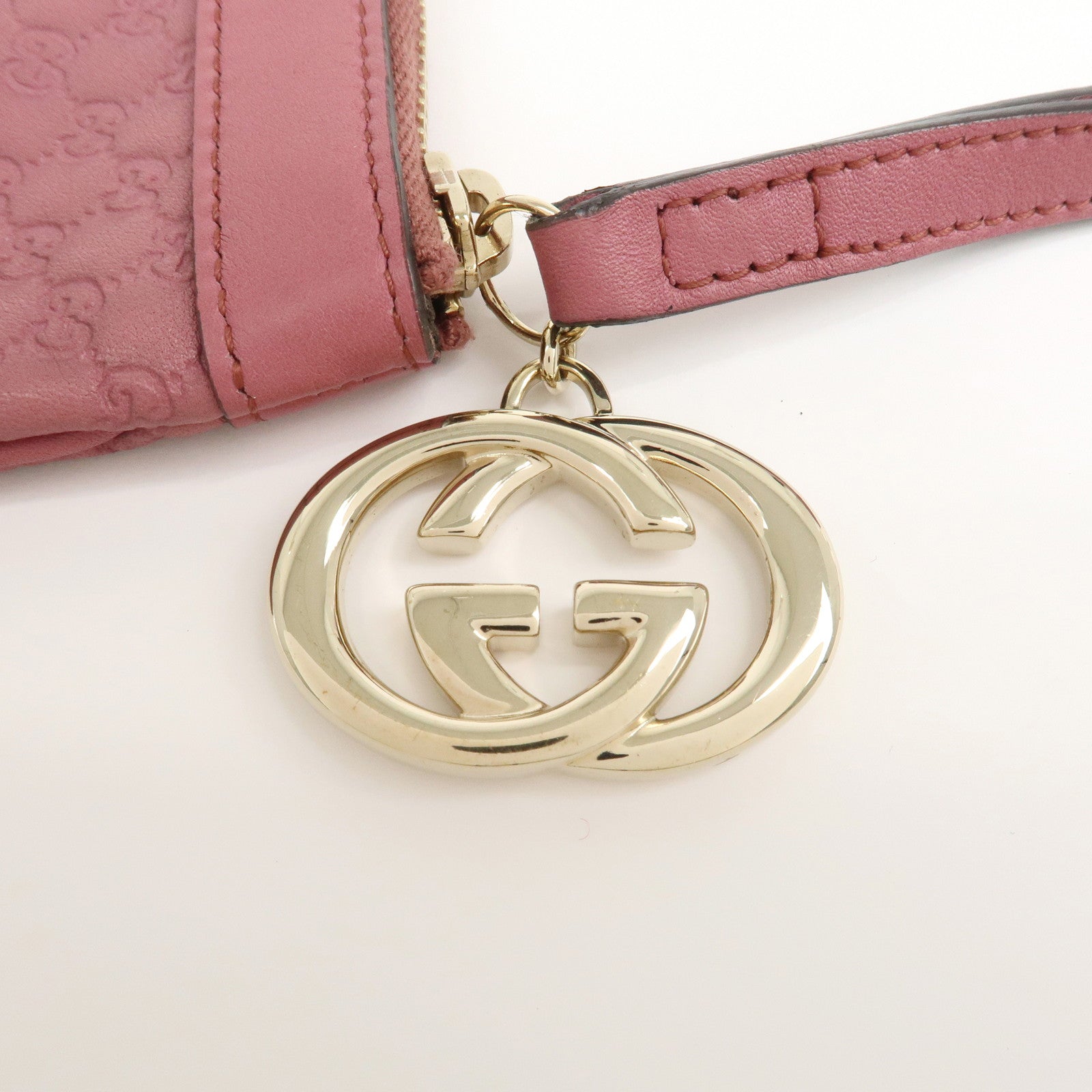 GUCCI Interlocking G Micro Guccissima Leather Pouch Pink 212203