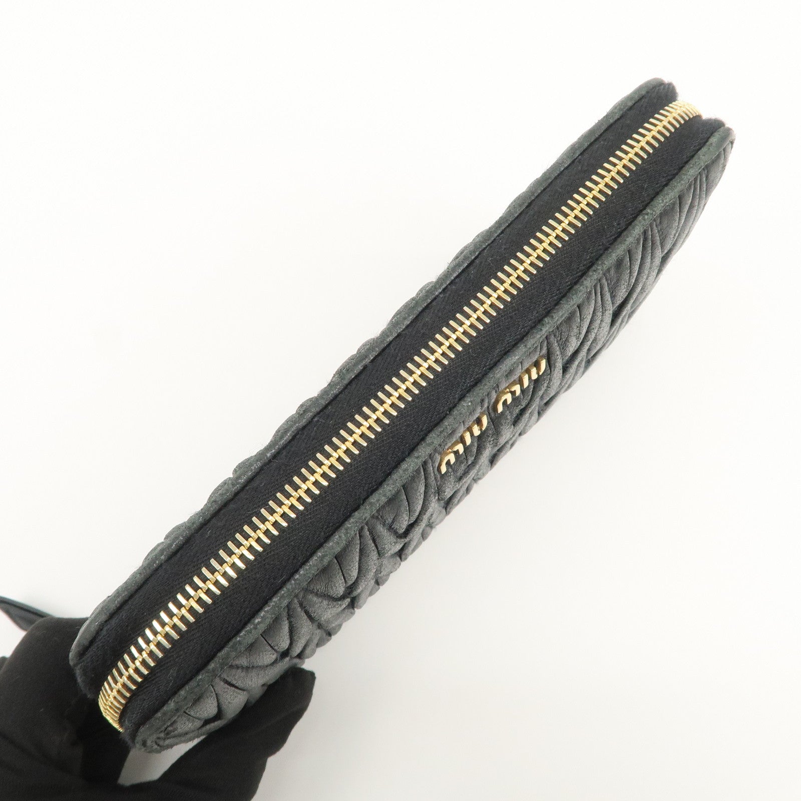 MIU MIU Logo Matelasse Nappa Leather Zippy Long Wallet Black