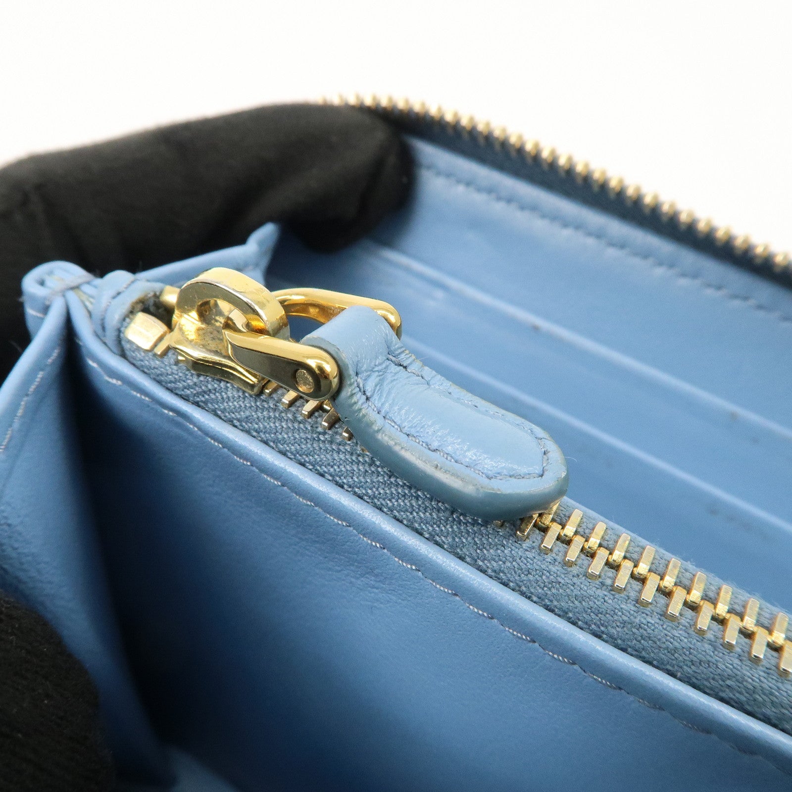 PRADA Logo Vitello Move Leather Zippy Long Wallet Light Blue 1ML506