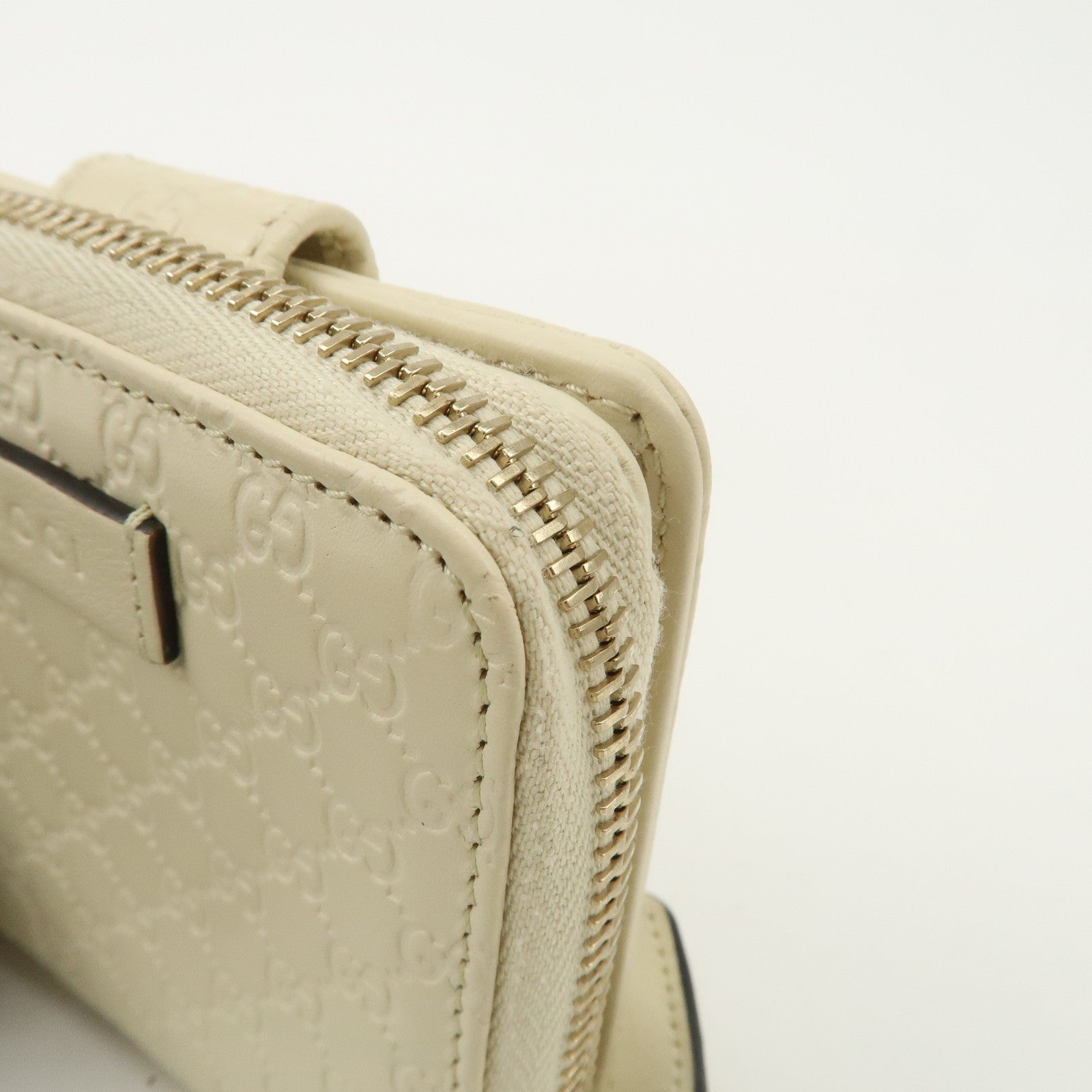 GUCCI Micro Guccissima Leather Signature Bi-Fold Compact Wallet Ivory Used