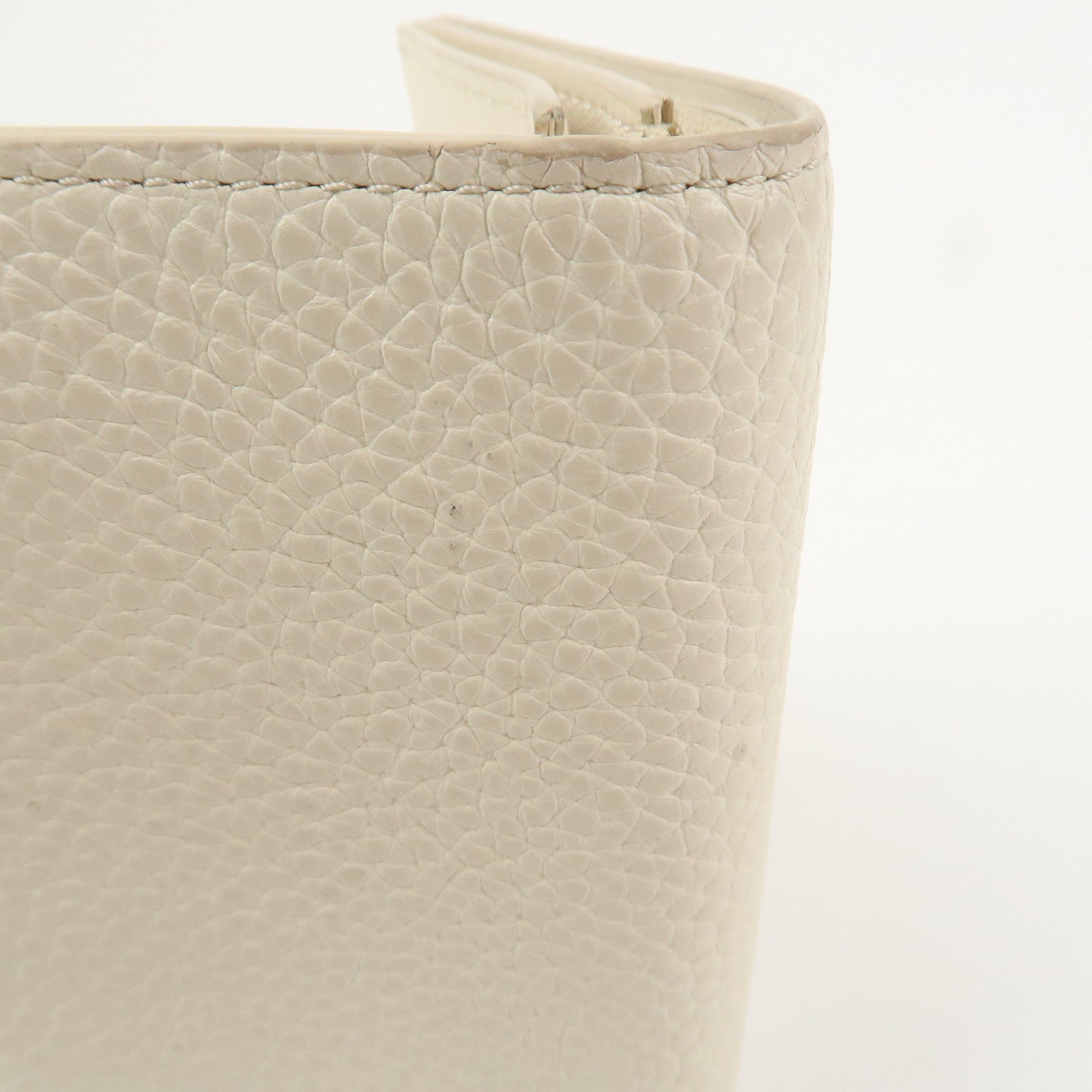 Louis Vuitton Capcines Taurillon Leather Vertical Wallet M11169