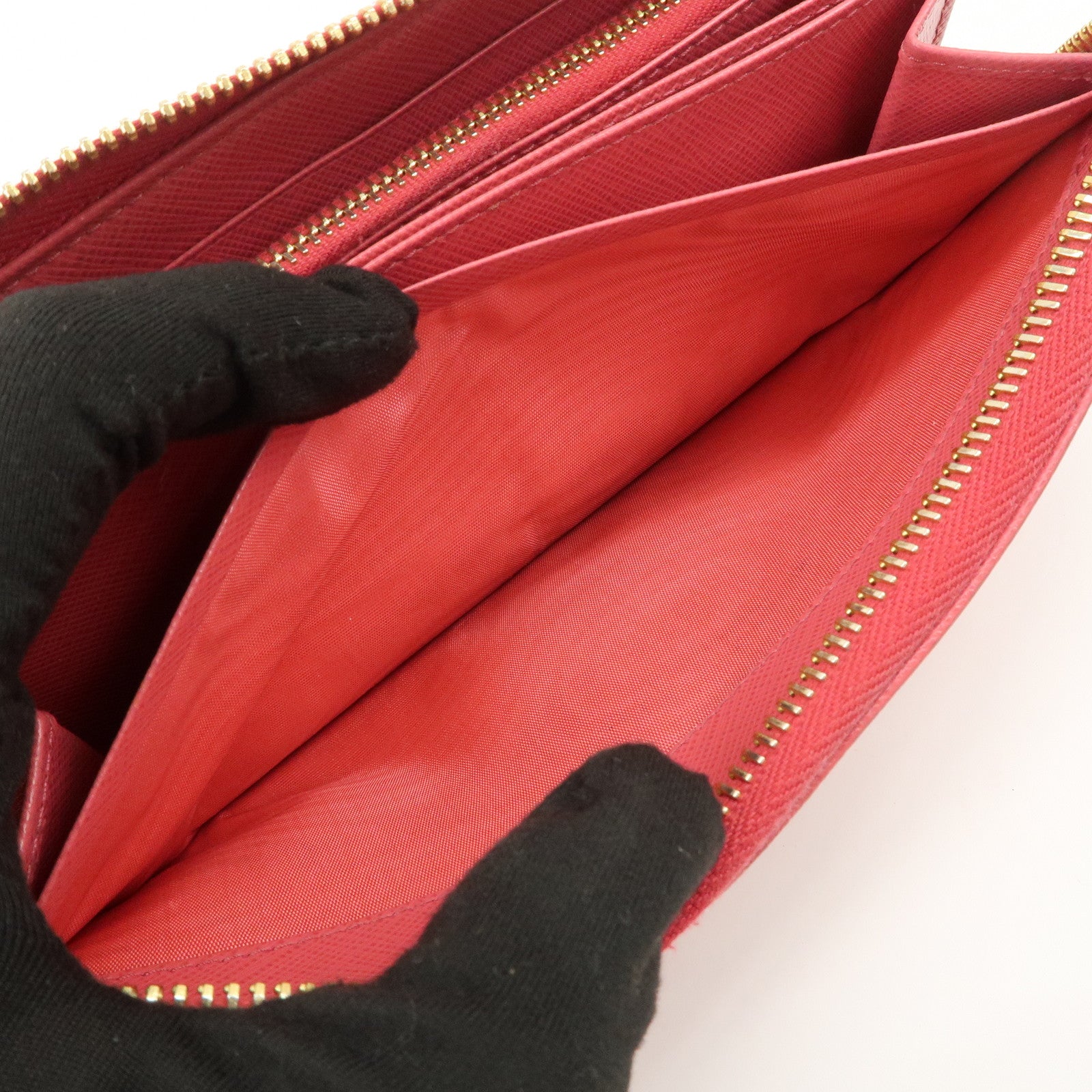 PRADA Logo Saffiano Leather Round Zippy Long Wallet Pink 1M0506