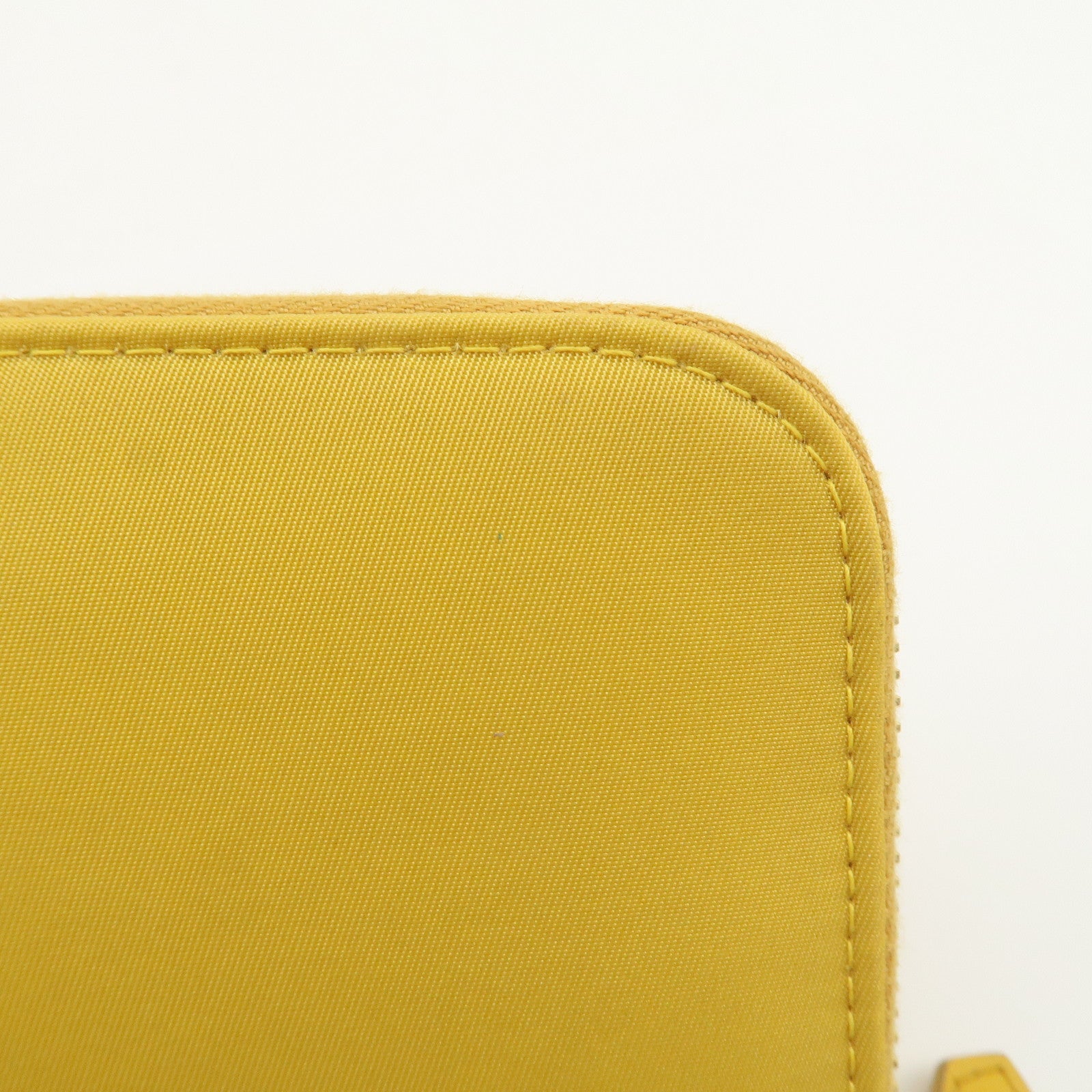 PRADA Triangle Logo Nylon Leather Round Zippy Long Wallet Yellow