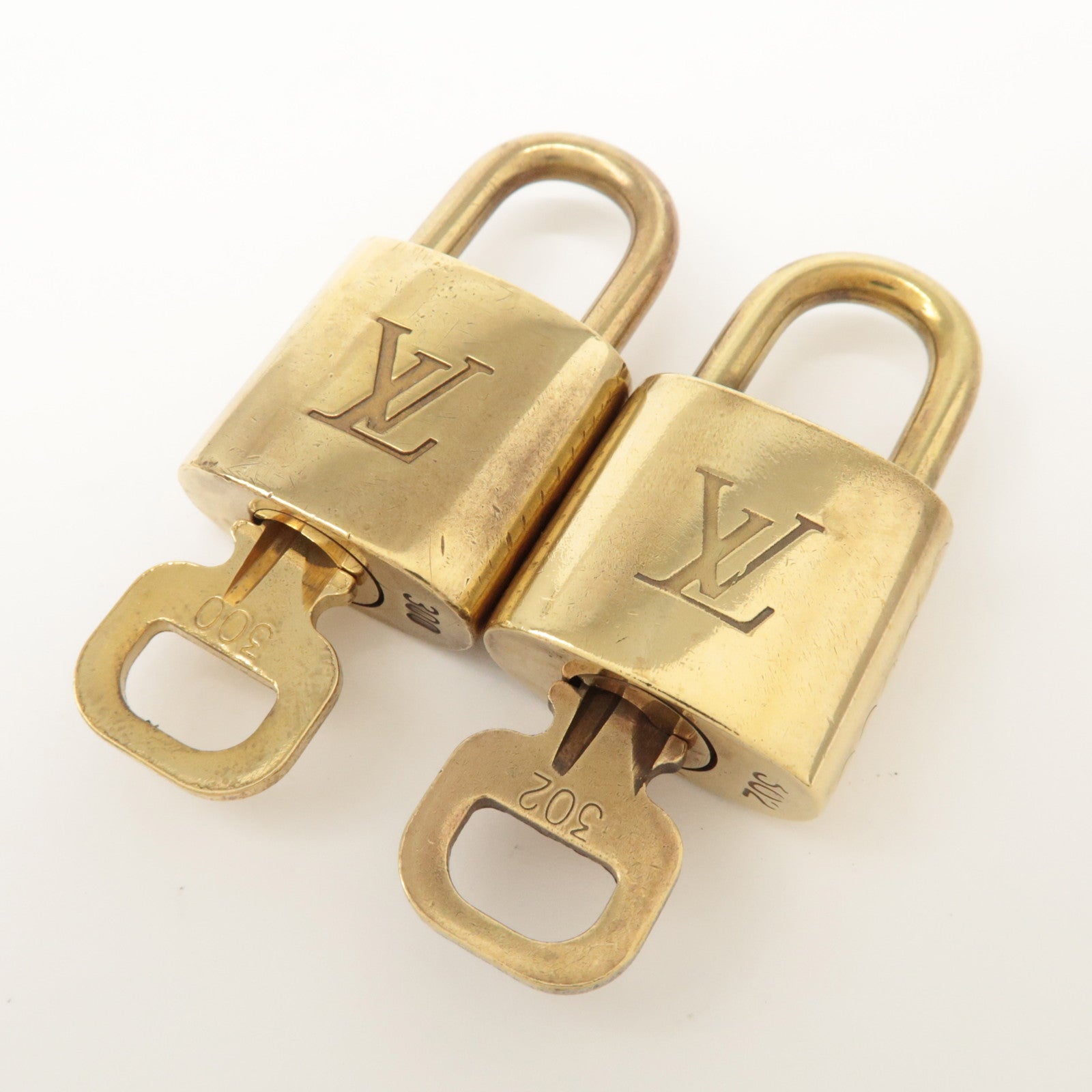 Louis Vuitton Set of 10 Lock & Key Cadena Key Lock Metal Gold