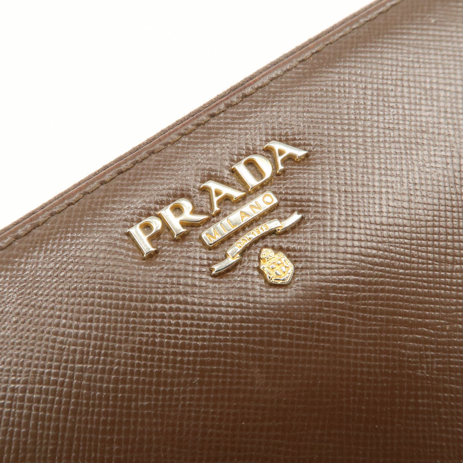 PRADA Triangle Logo Saffiano Leather Round Zippy Wallet 1M0506