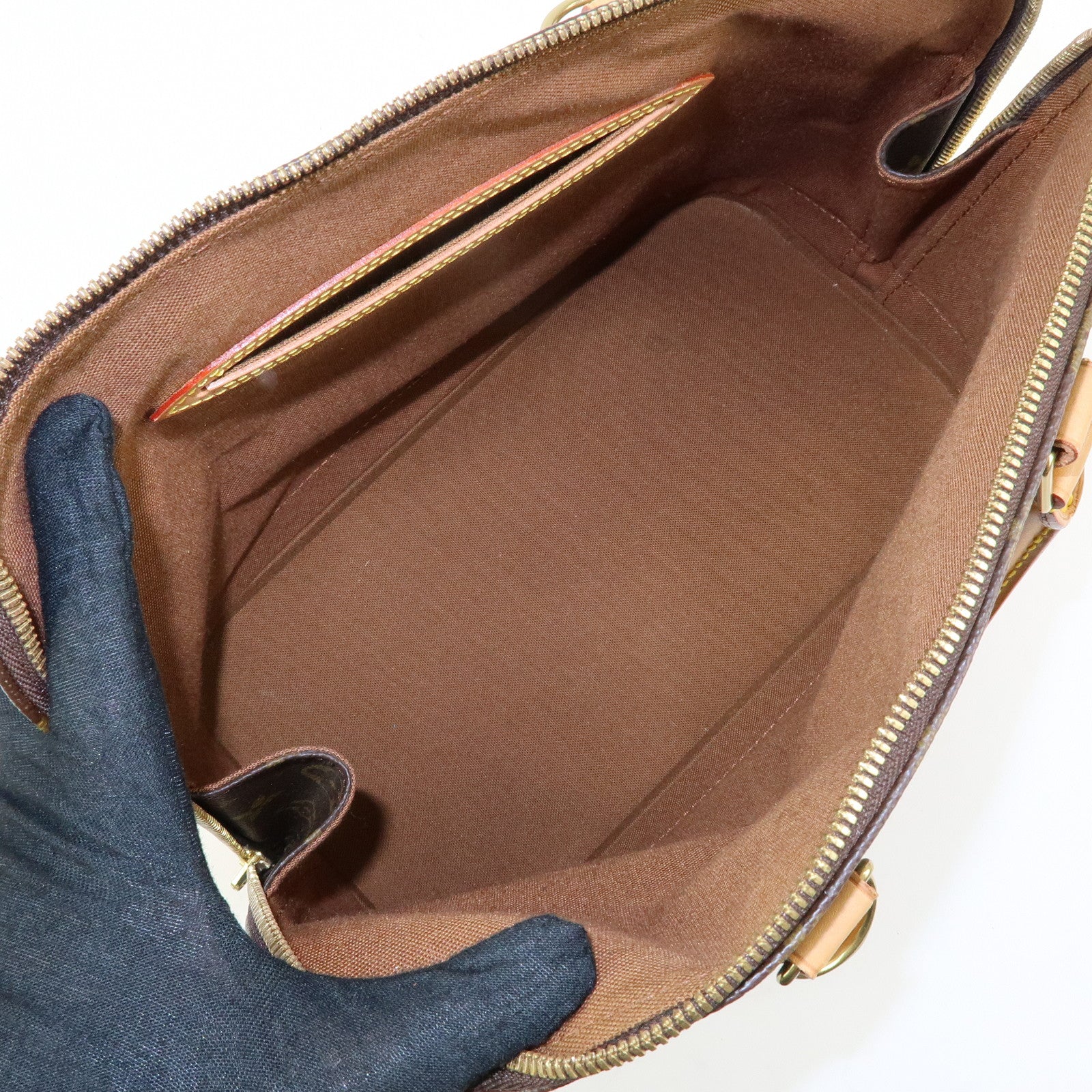 Louis Vuitton Monogram Alma Hand Bag Brown M51130