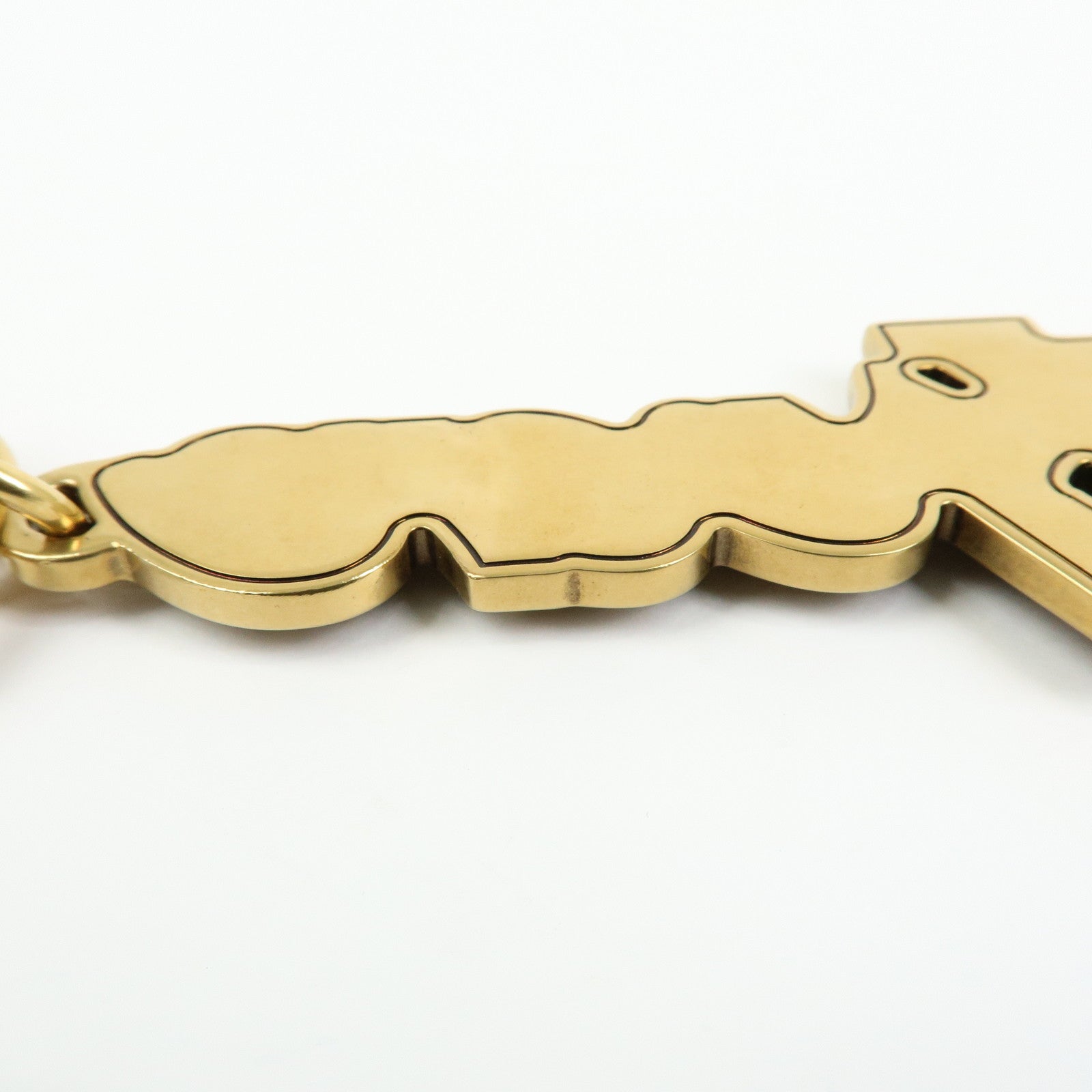 Louis Vuitton LV Lovers Studs Metal Bag Charm Key Chain Gold M01755