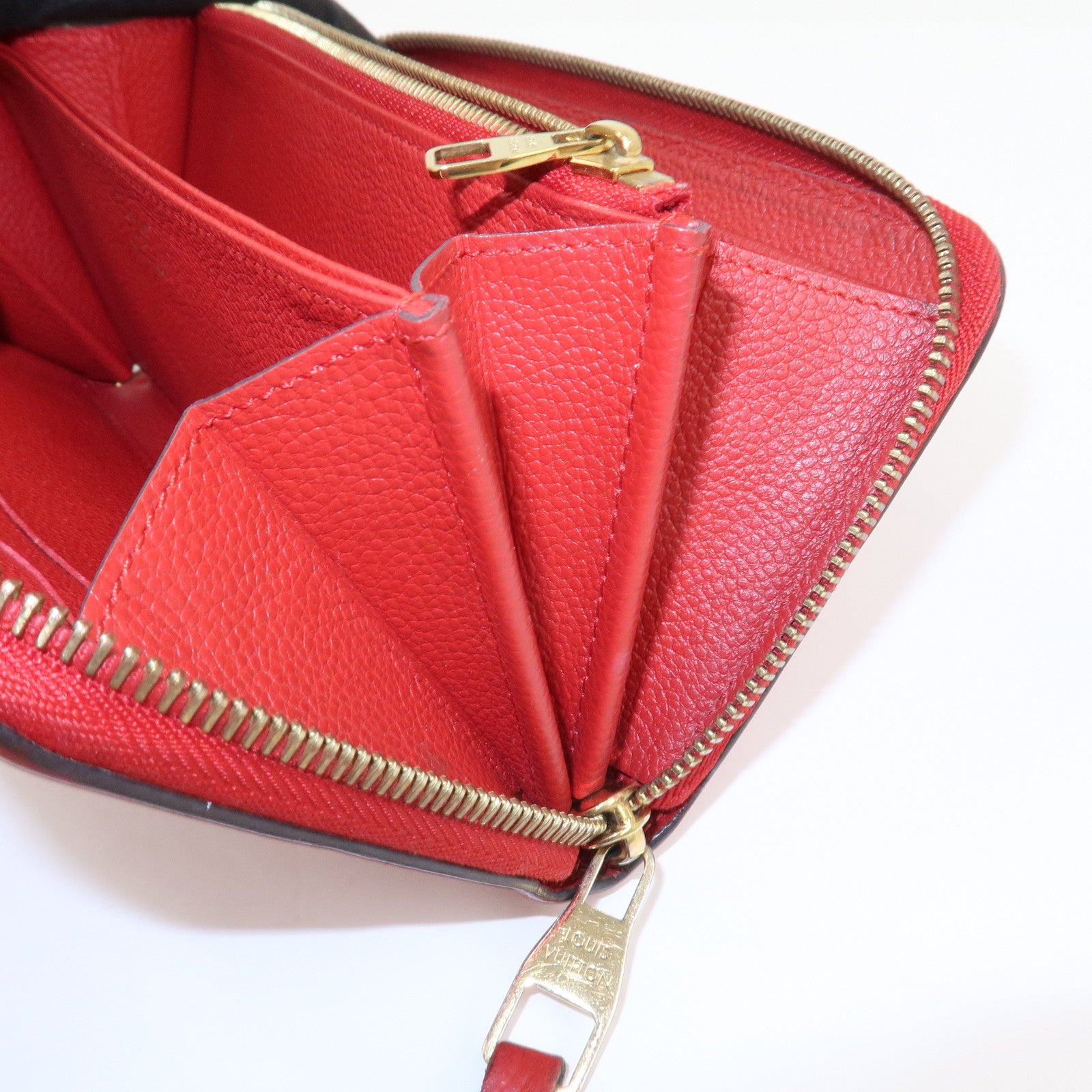 Louis Vuitton Monogram Empreinte Leather Round Zippy Wallet M68571
