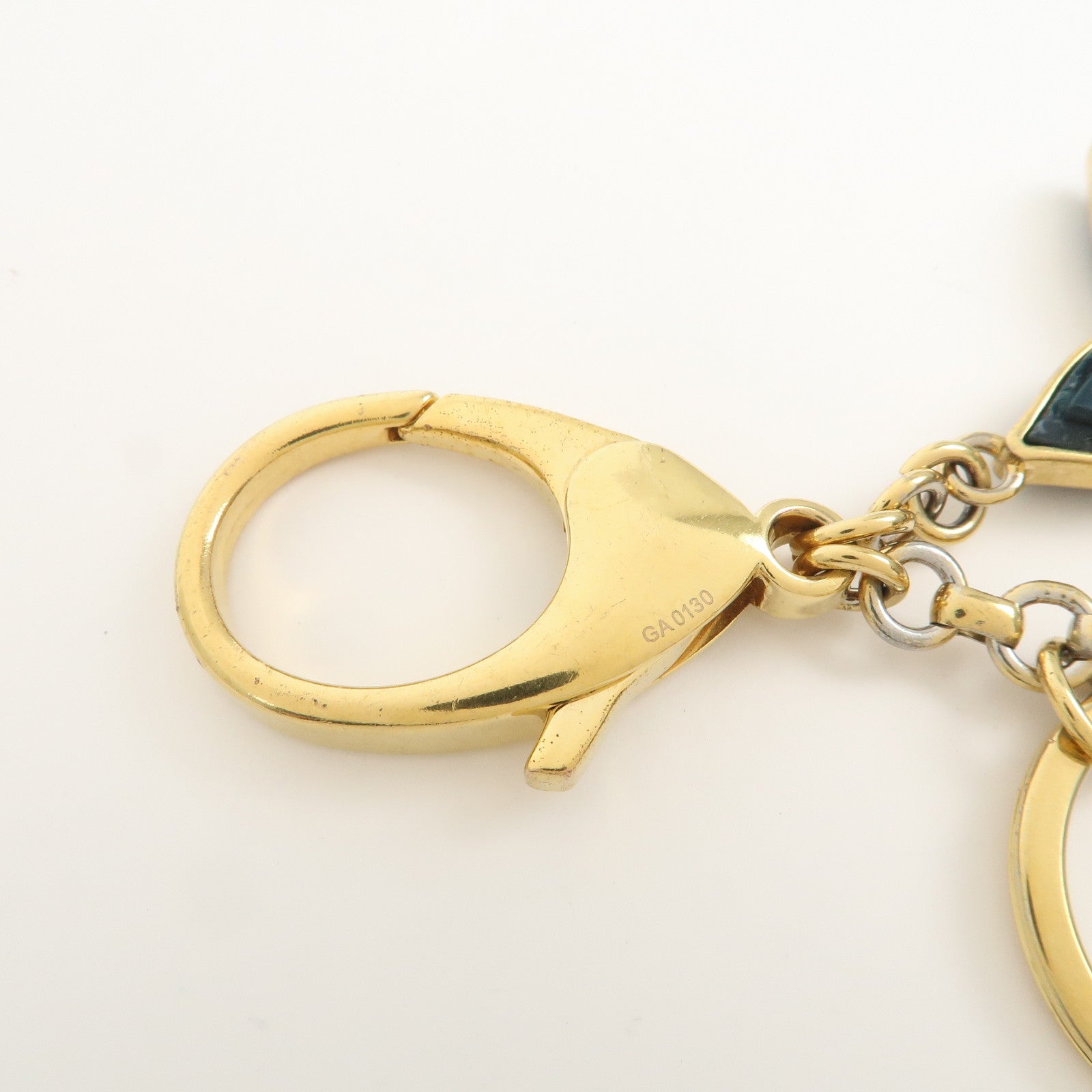 Louis Vuitton Bijou Sac Knife Metal Plastic Bag Charm Gold M66143