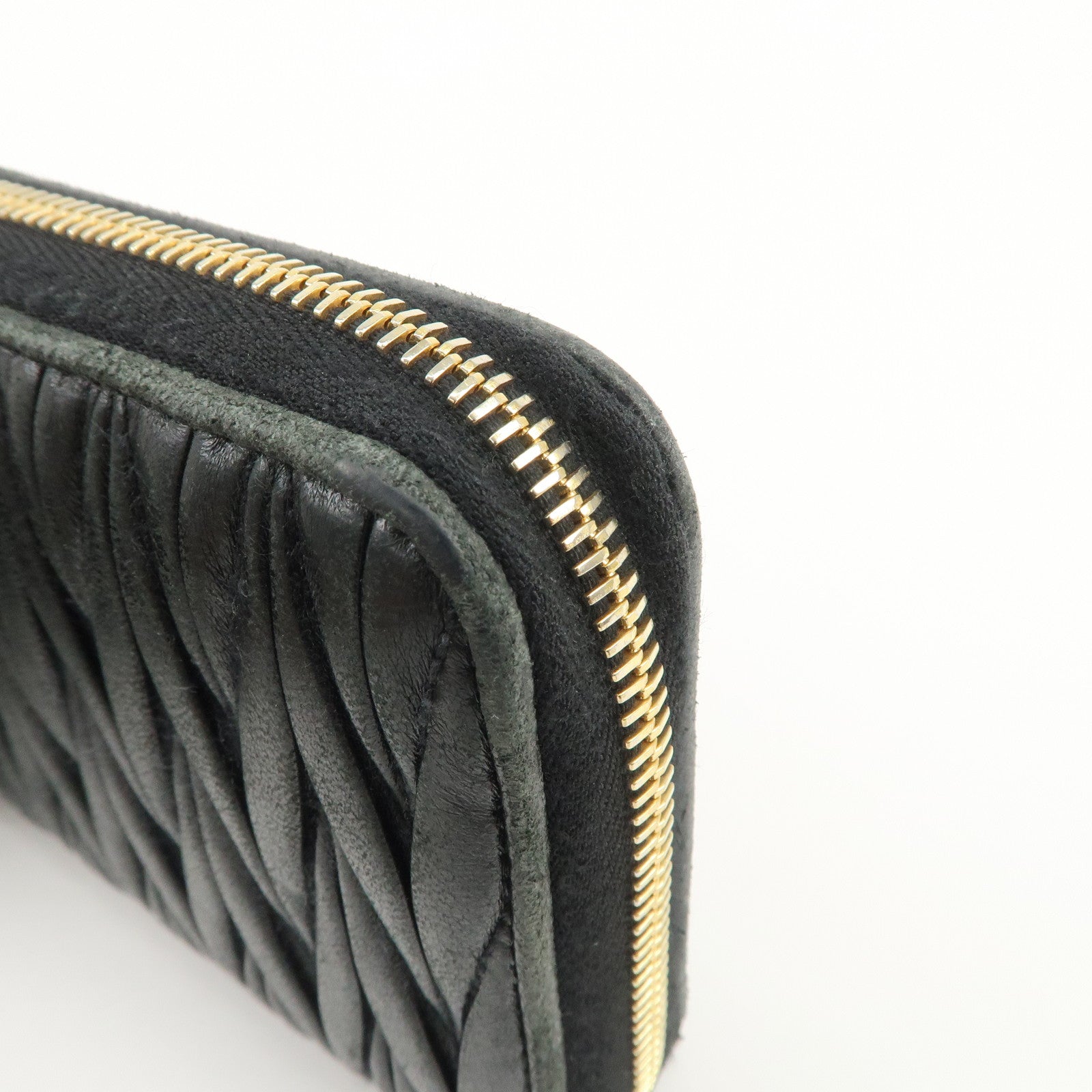 MIU MIU Logo Matelasse Nappa Leather Zippy Long Wallet Black