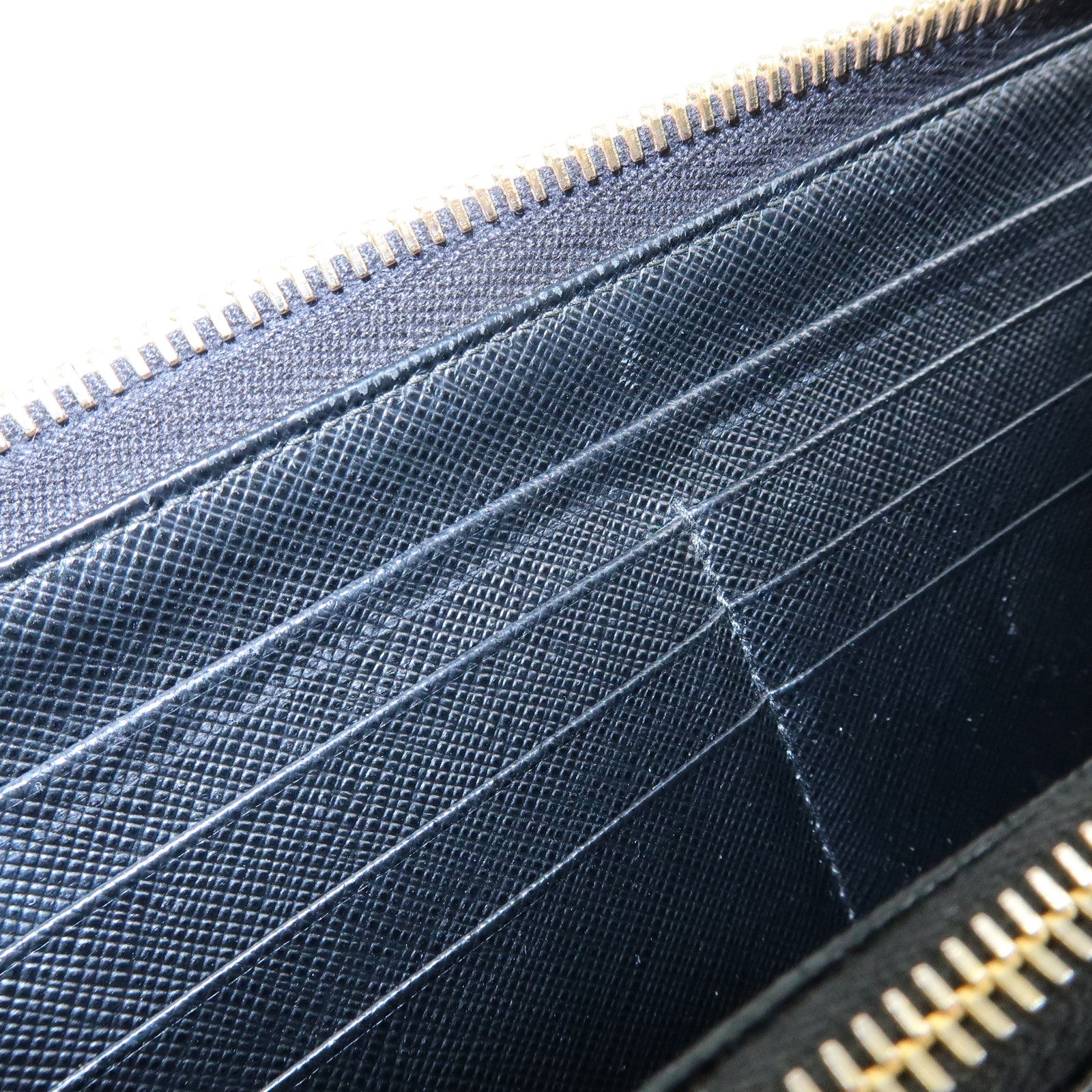 PRADA Saffiano Leather Round Zippy Long Wallet Black 1ML506