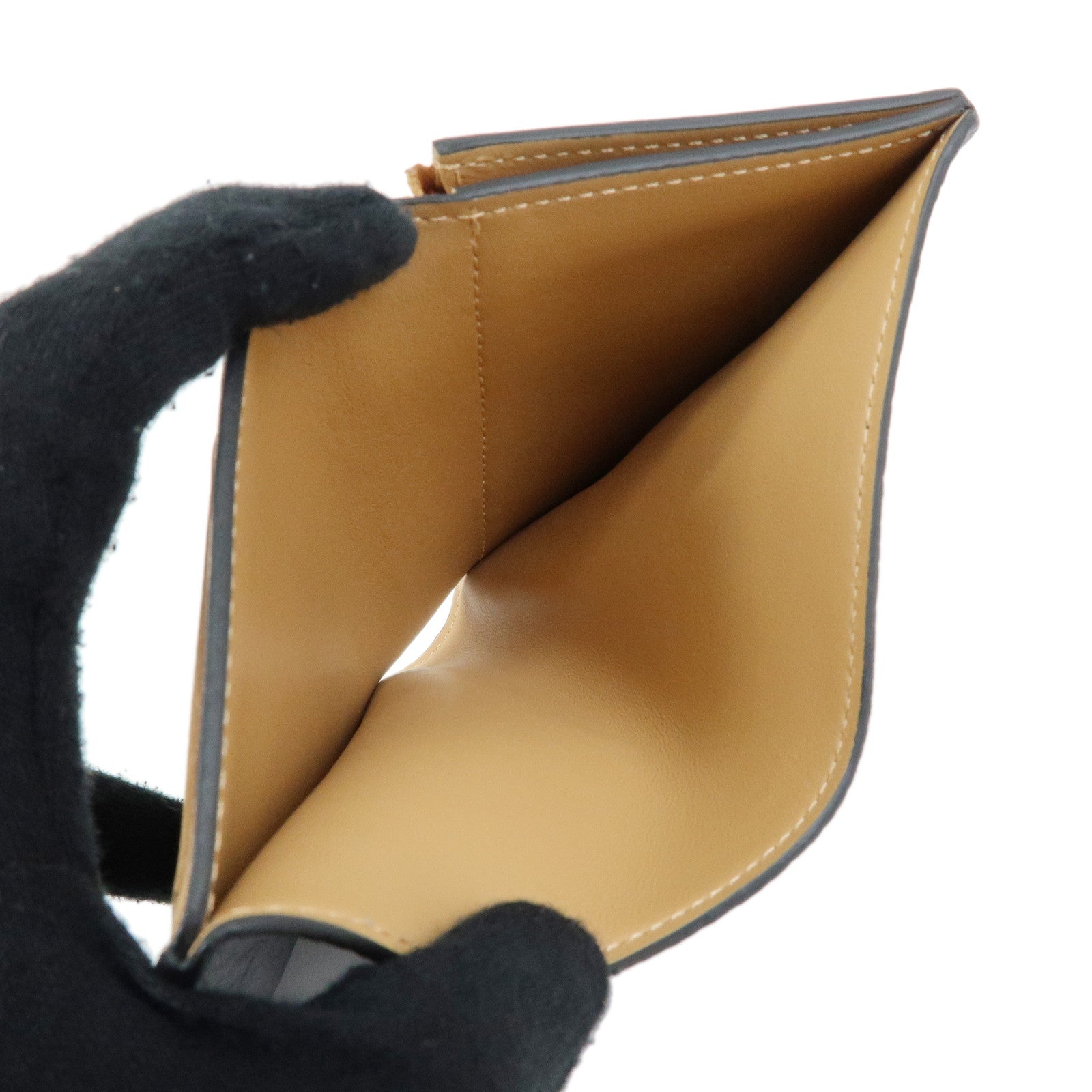 Louis Vuitton Taurillon Leather Vertical Compact Wallet Noir M81561