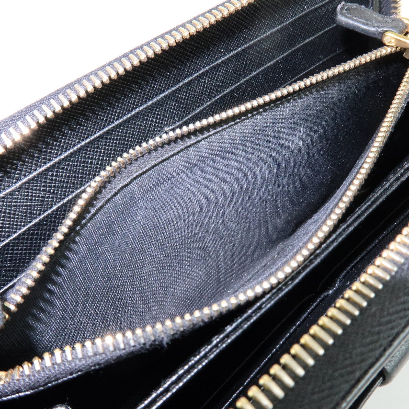 PRADA Saffiano Leather Ribbon Round Zippy Wallet Black 1M0506