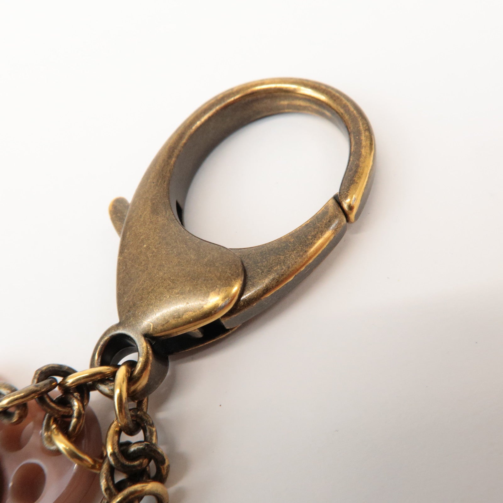 Louis Vuitton Bijoux Sac Lock Flower Metal Plastic Key Chain M65851