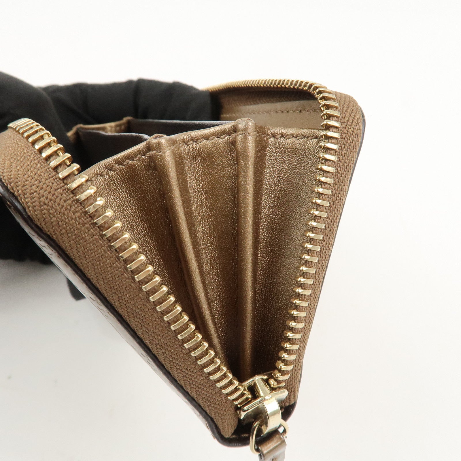 GUCCI Micro Guccissima Leather Zippy Wallet Card Case Bronze 255452