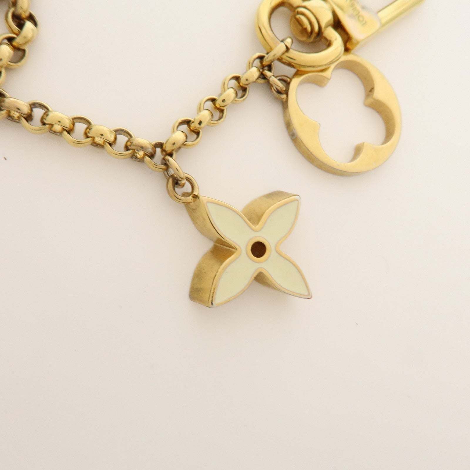 Louis Vuitton Fleur de Monogram Bag Charm Key Chain Gold M65111