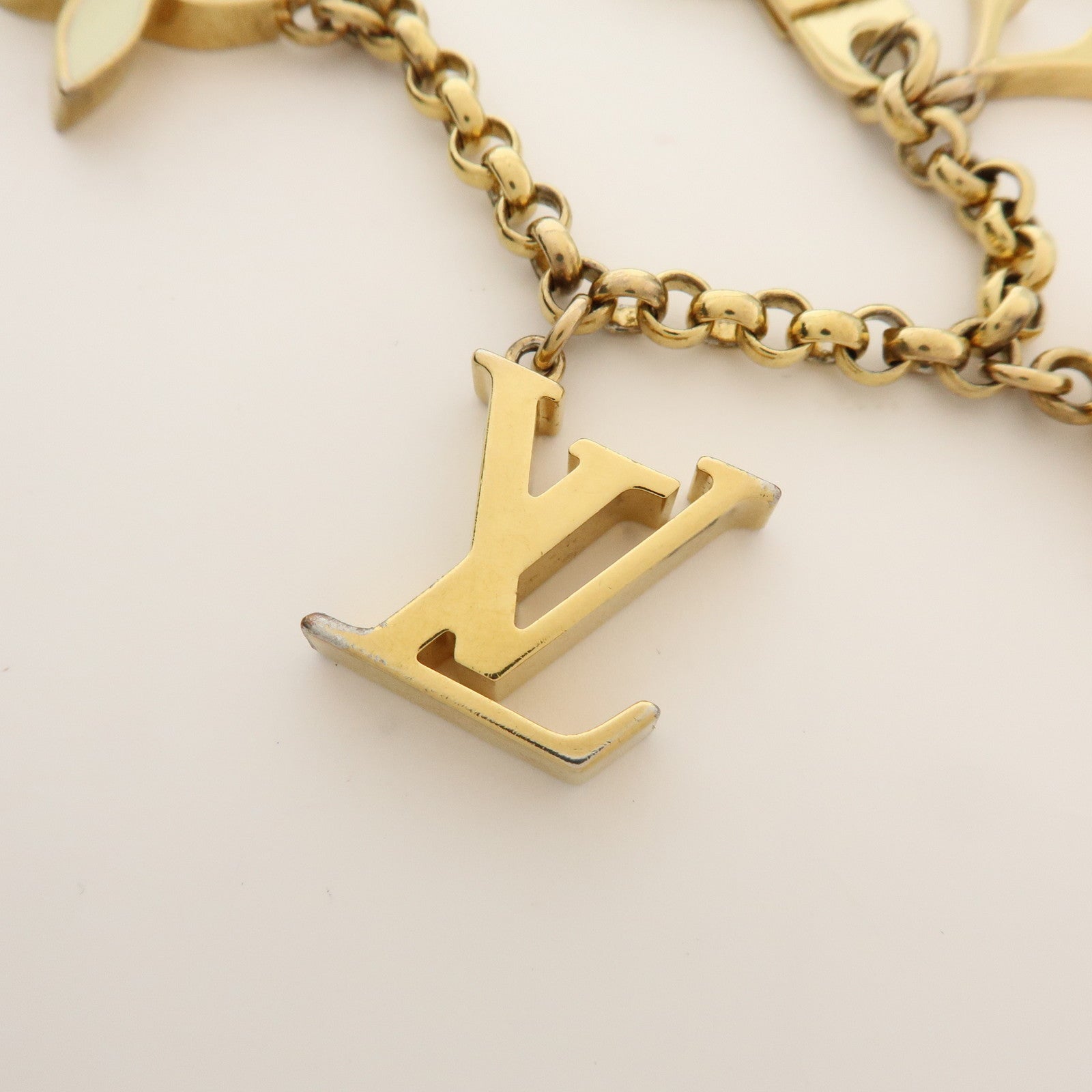 Louis Vuitton Fleur de Monogram Bag Charm Key Chain Gold M65111