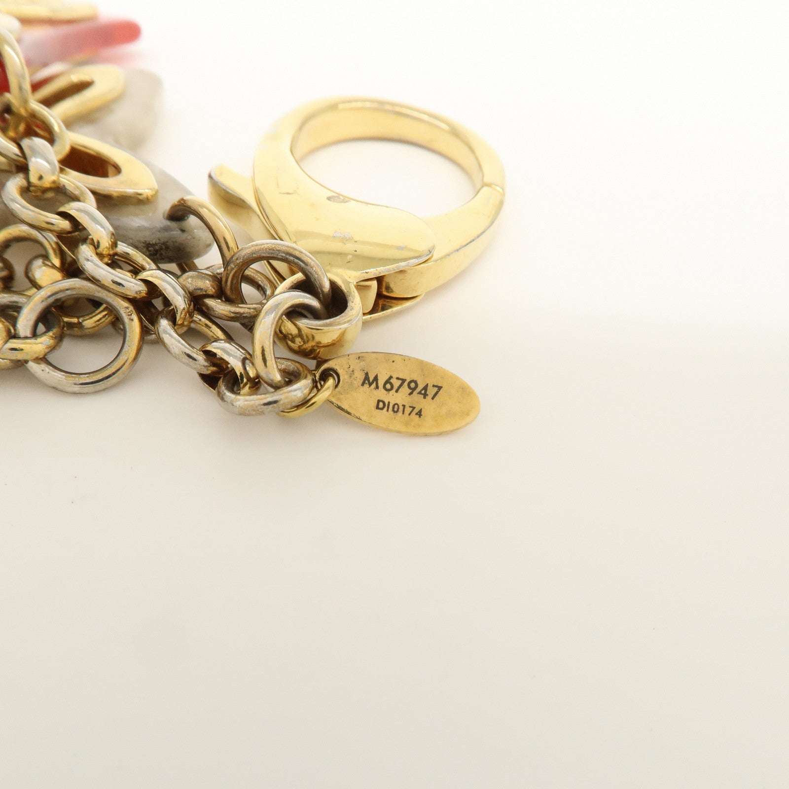 Louis Vuitton Bijoux Sac Insolence Bag Charm Gold Red M67947