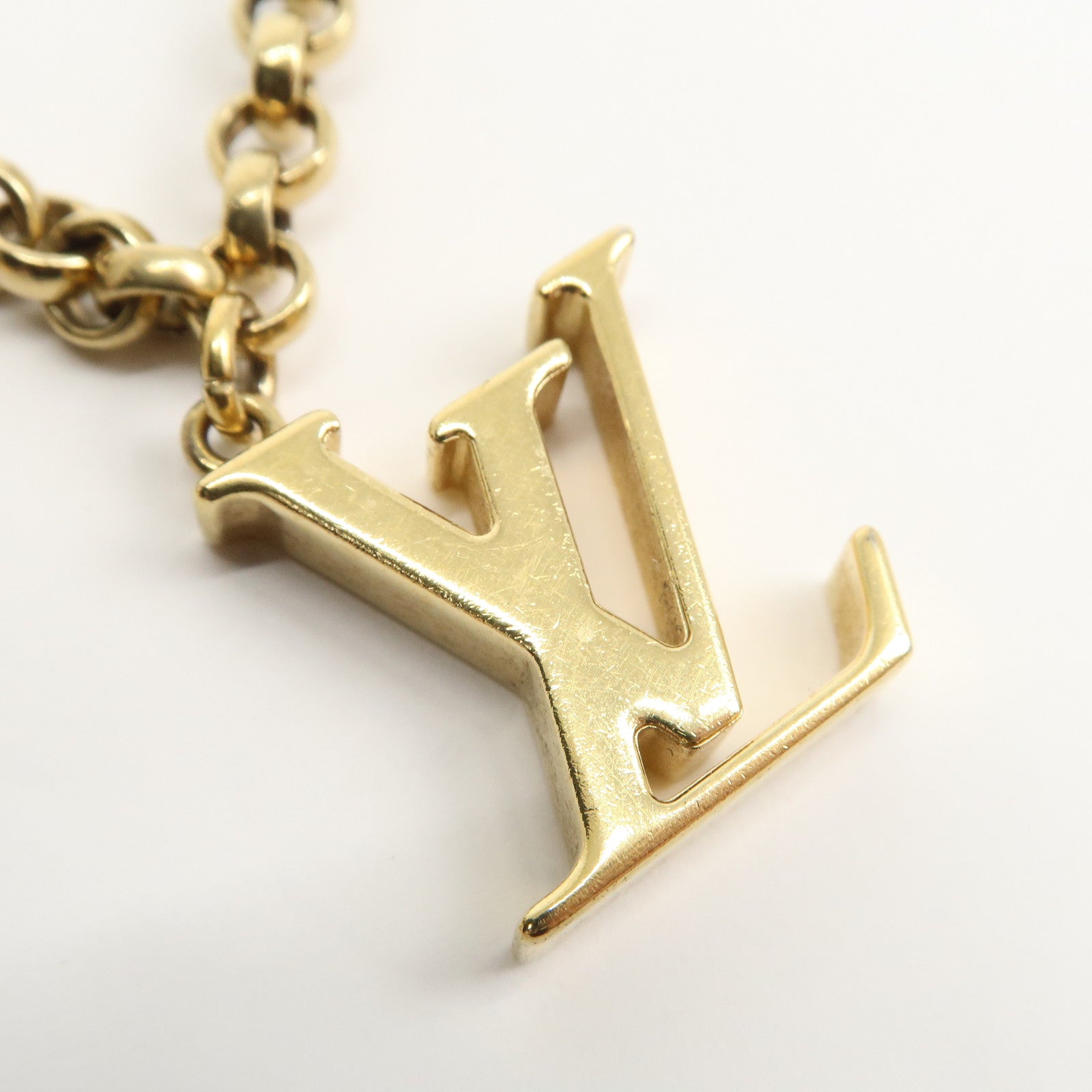 Louis Vuitton Fleur de Monogram Bag Charm Key Chain Gold M65111