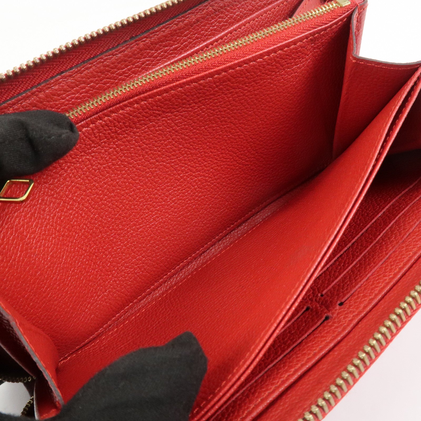 Louis Vuitton Monogram Empreinte Leather Round Zippy Wallet M68571